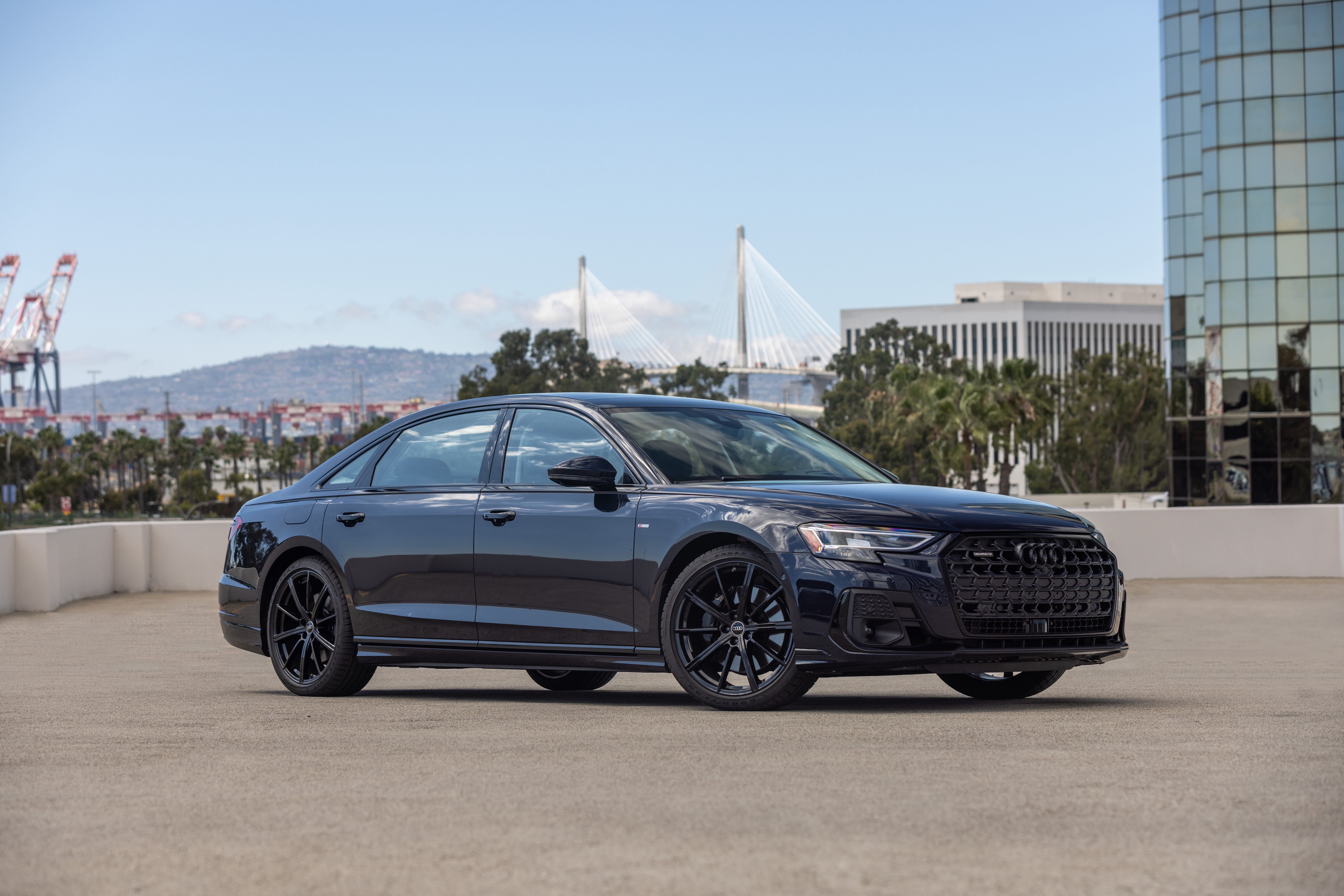 Dark Audi A8 Sedan parked outdoors HD Wallpaper