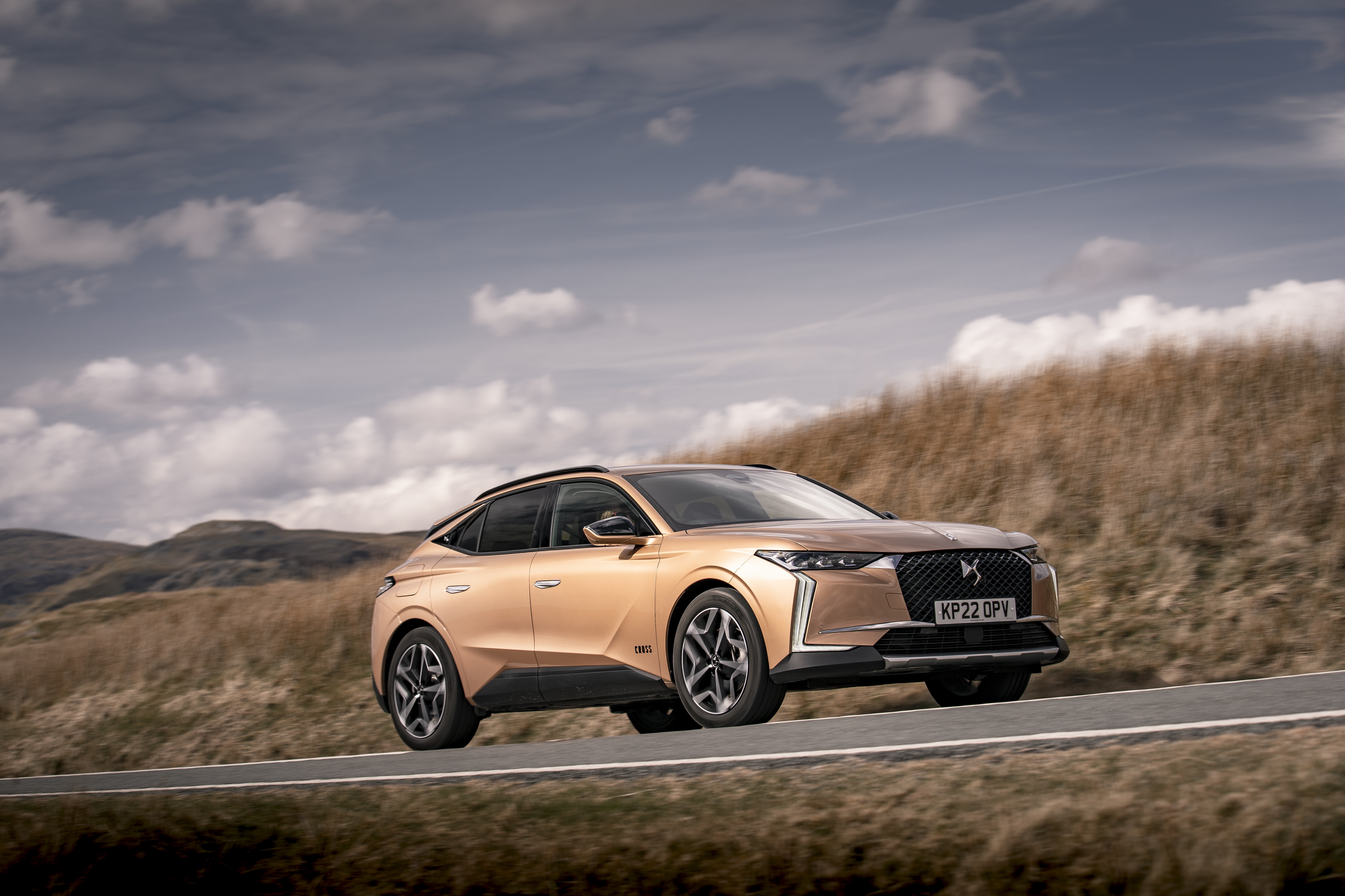 DS 4 Cross driving on a road HD Wallpaper