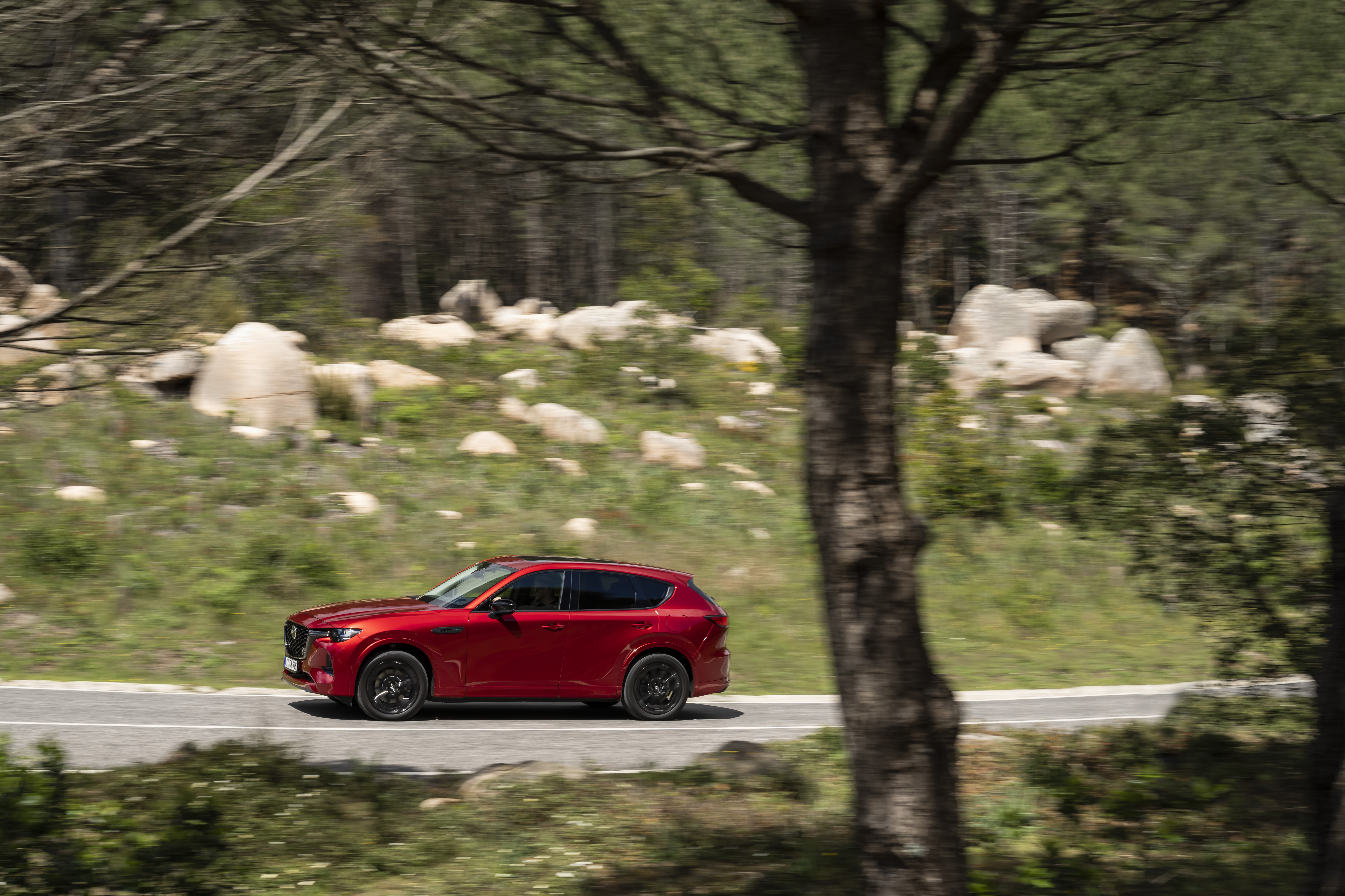 Red Mazda CX-60 driving on a road HD Wallpaper