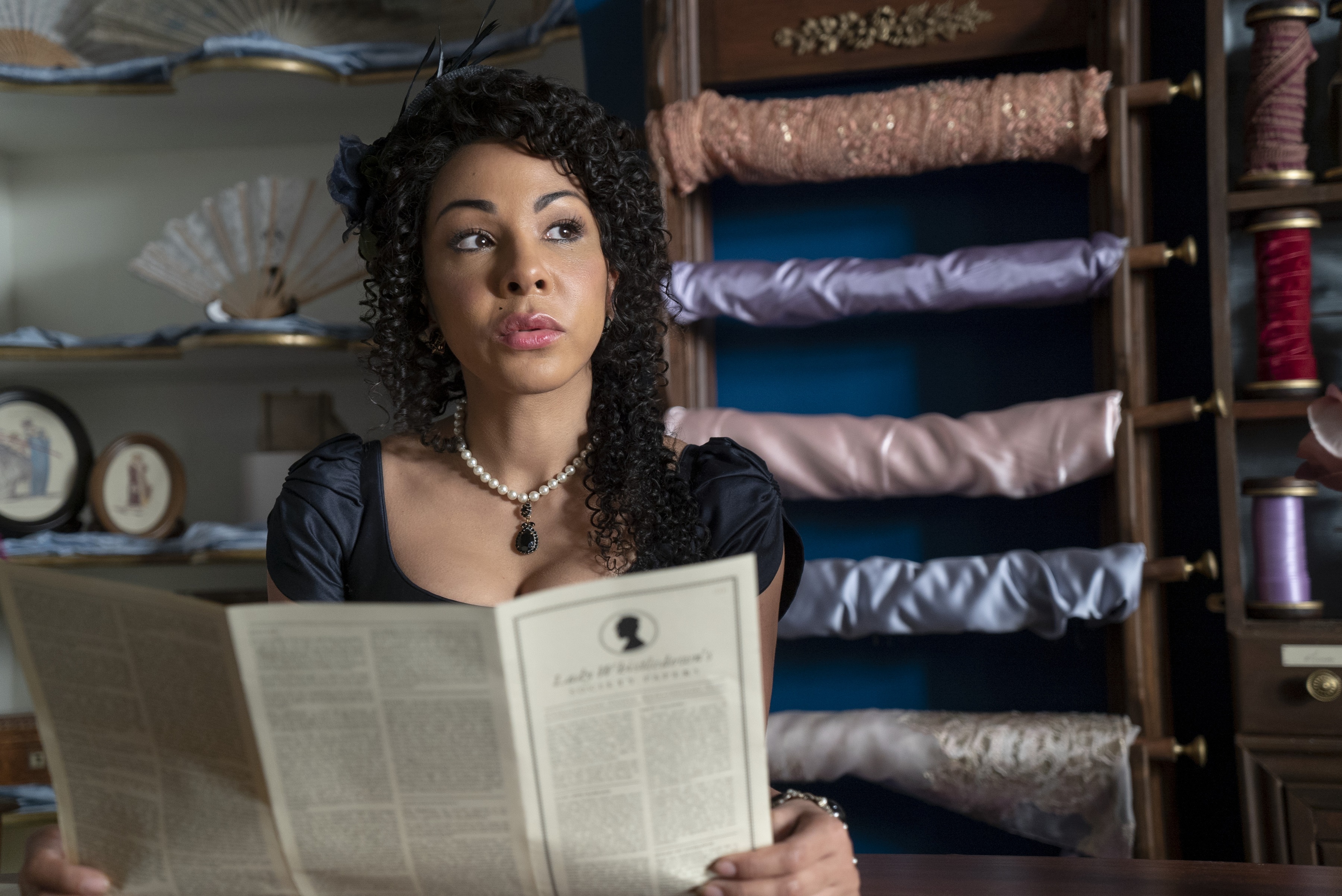 Woman from Bridgerton reading a newspaper HD Wallpaper