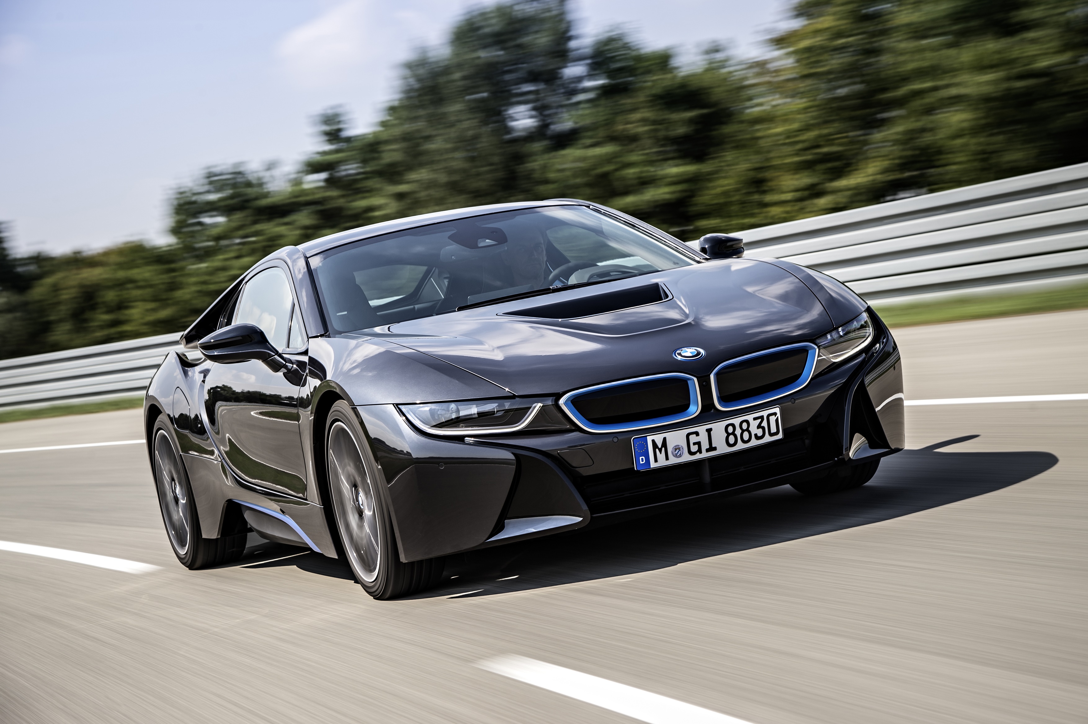Black BMW i8 driving on a race track HD Wallpaper