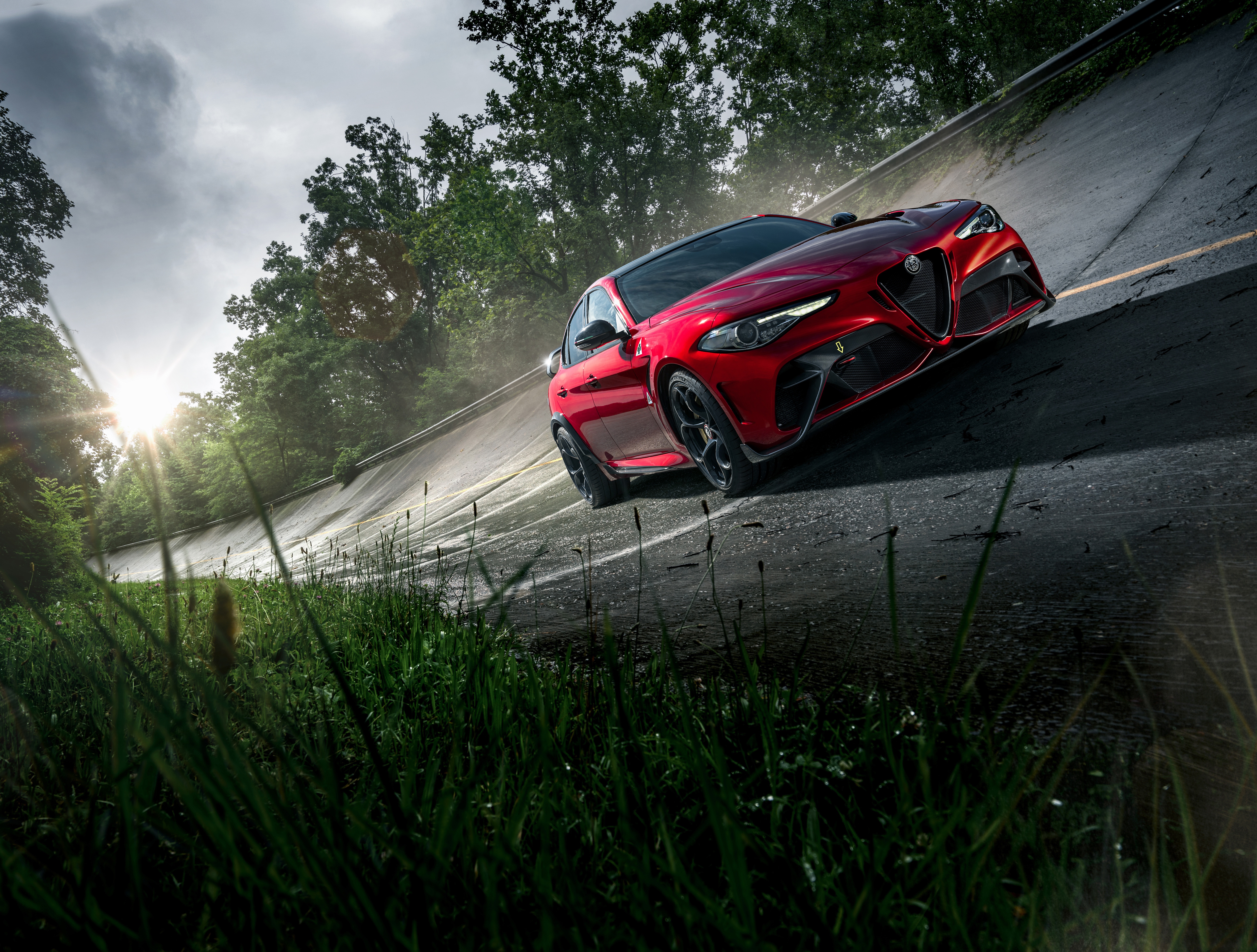 Red Alfa Romeo Giulia GTA on a Racetrack HD Wallpaper