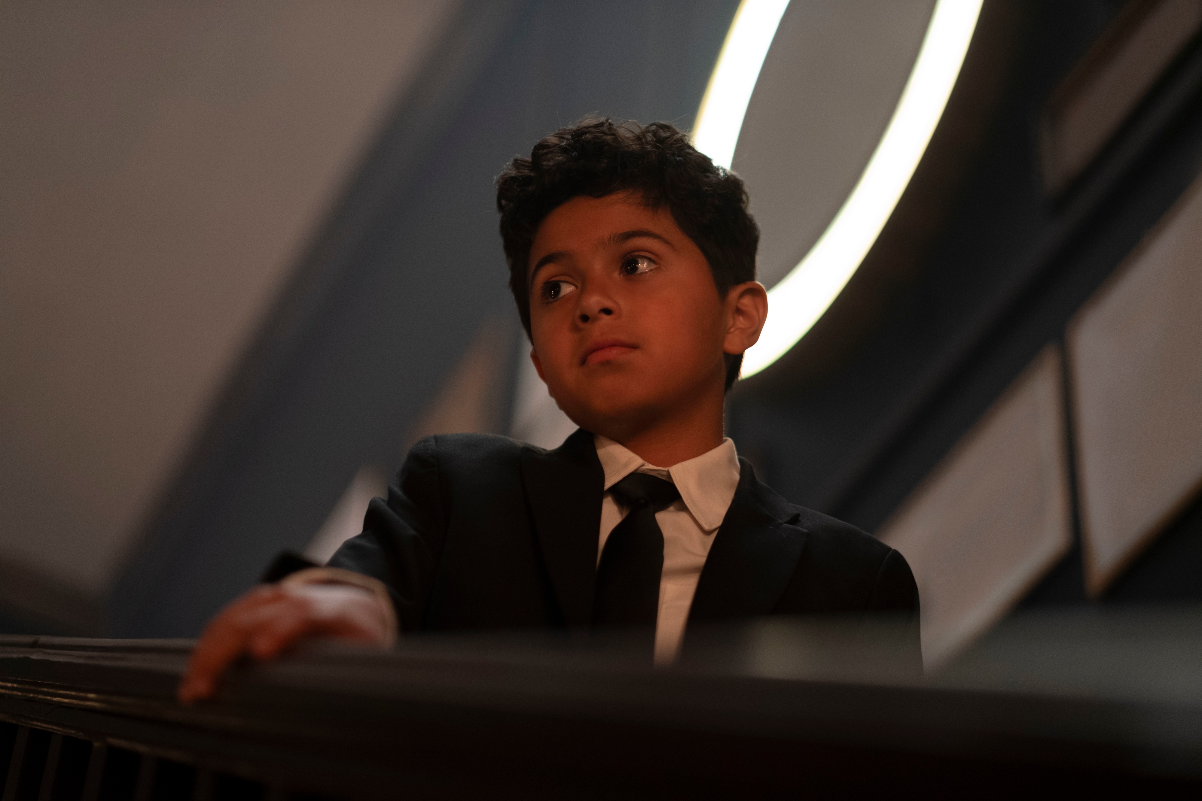 Young boy in suit from Moon Knight 4K HD Wallpaper