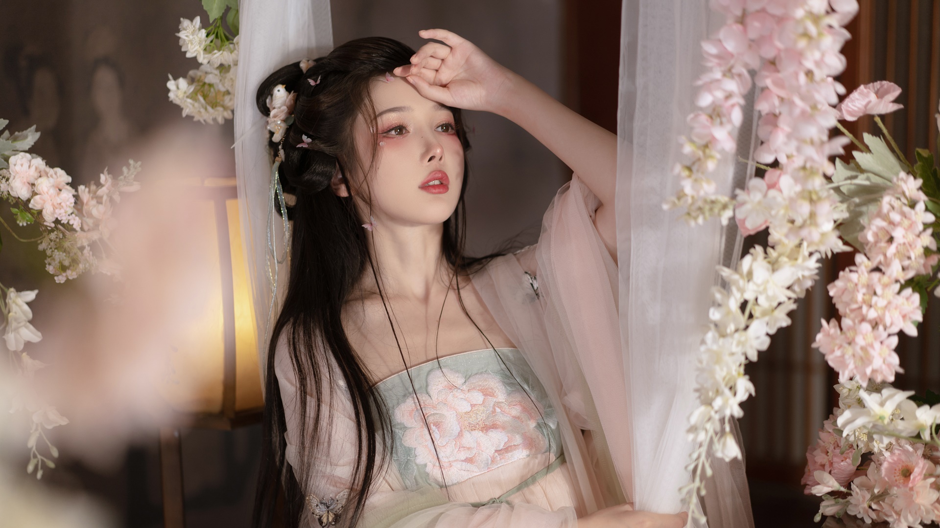 Woman in traditional Chinese dress with flowers HD Wallpaper