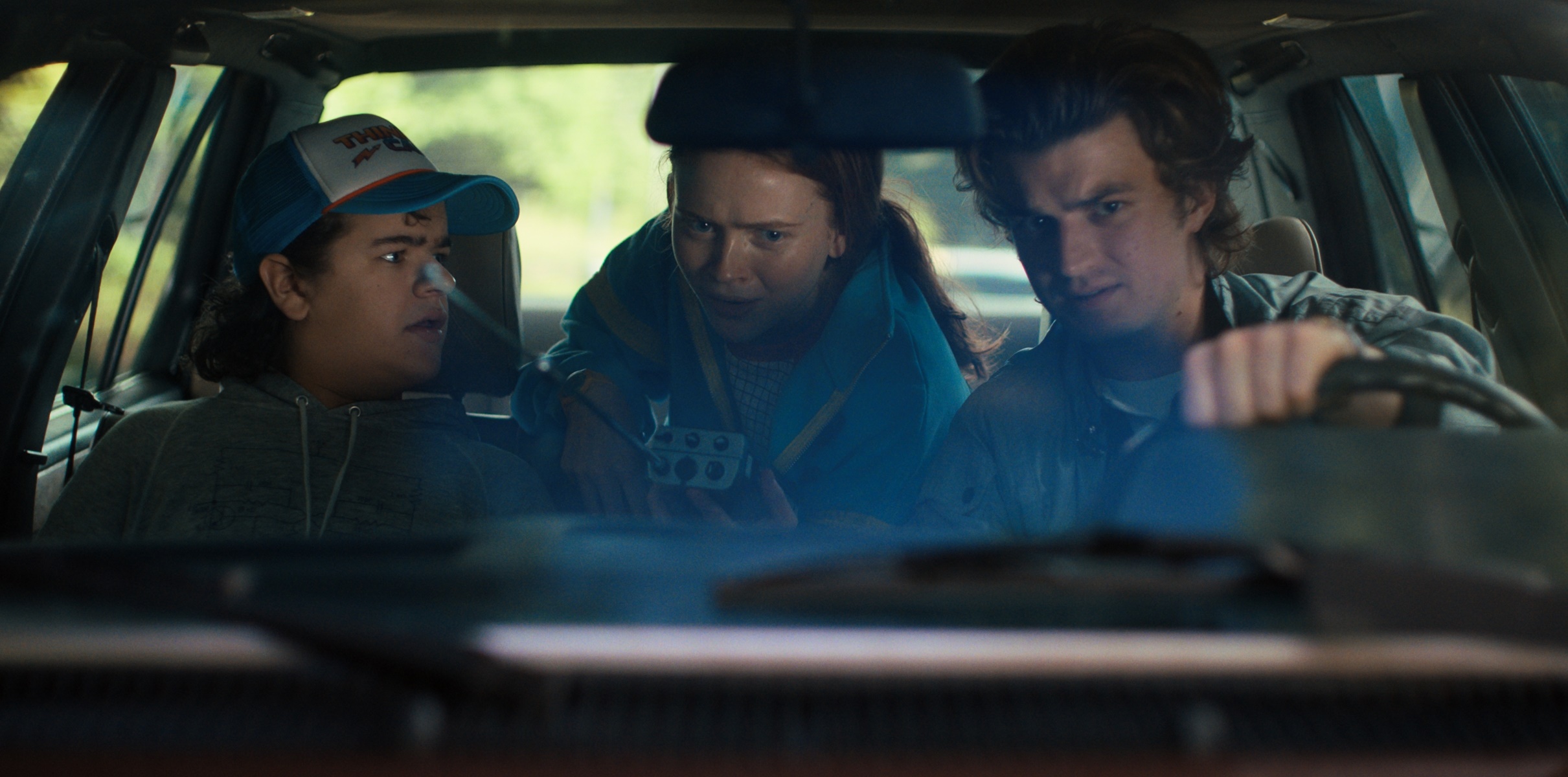 Dustin, Max, and Steve from Stranger Things in a car HD Wallpaper