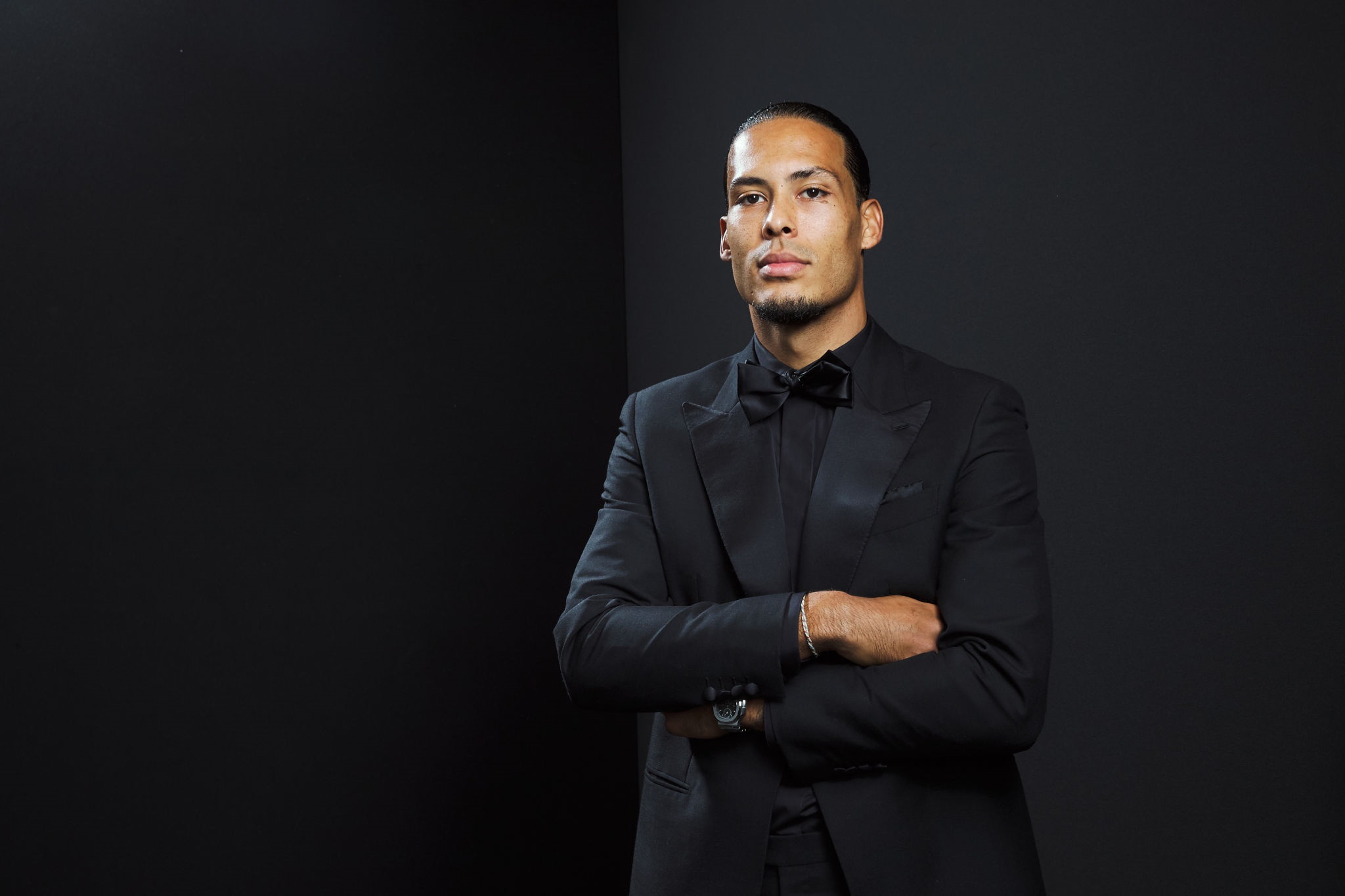 Virgil Van Dijk in a black tuxedo HD Wallpaper