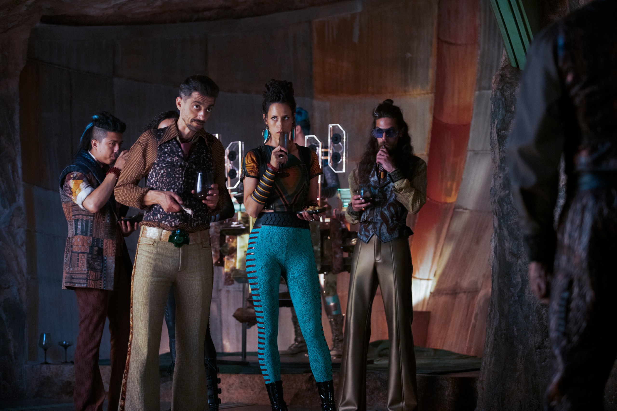 People in futuristic clothing holding drinks HD Wallpaper