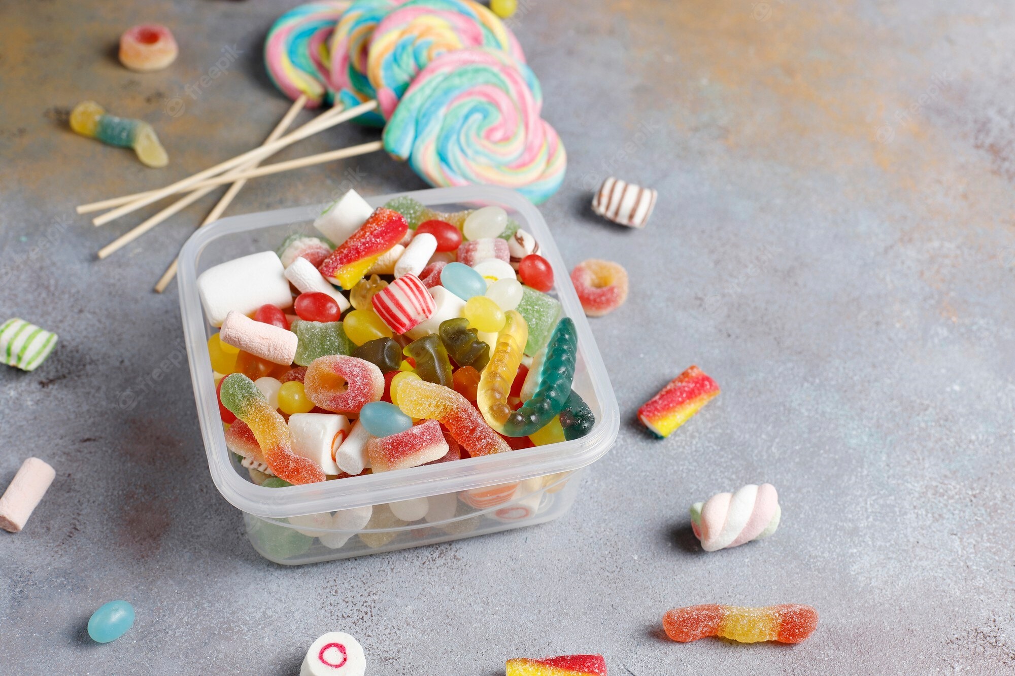 Assortment of colorful candies and lollipops HD Wallpaper