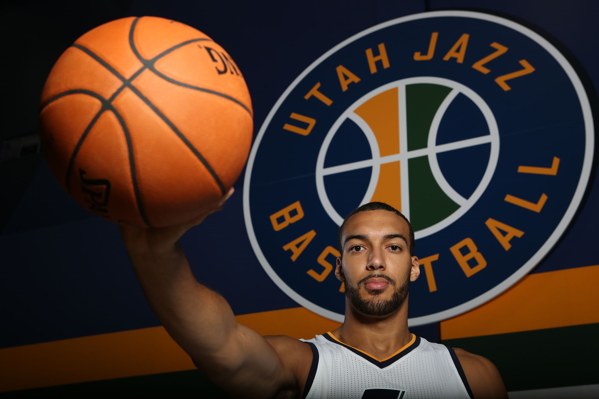 Rudy Gobert from Utah Jazz holding a basketball HD Wallpaper
