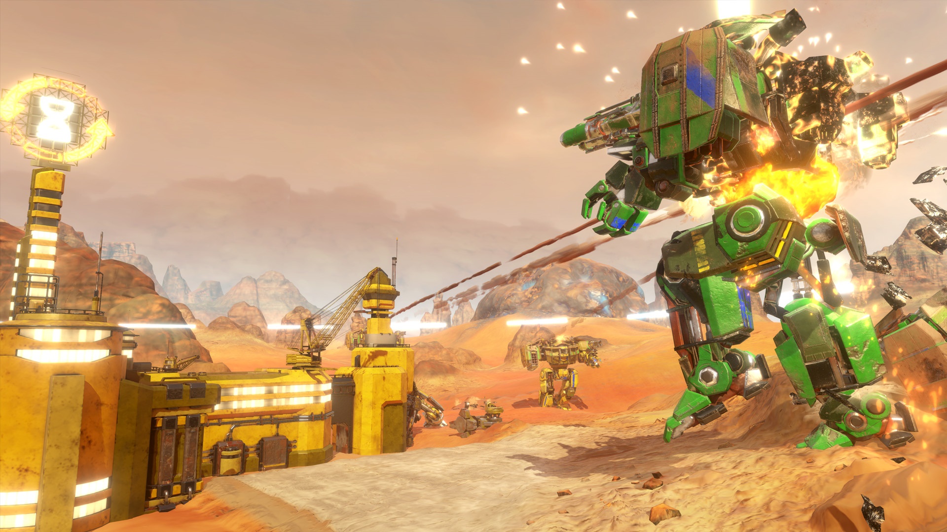 Mechs in a desert landscape with industrial structures HD Wallpaper