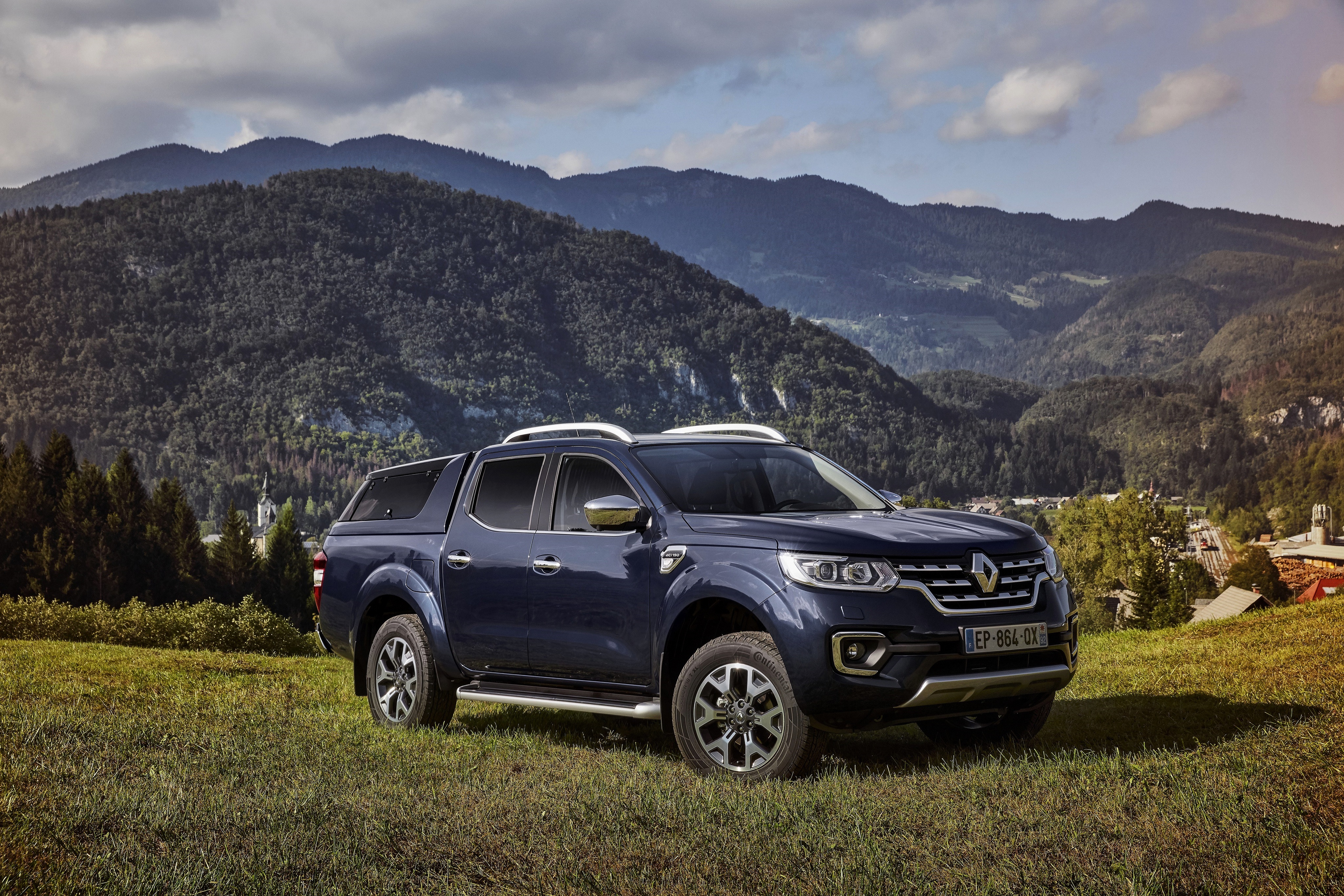 Renault Alaskan pickup truck in a mountainous landscape HD Wallpaper