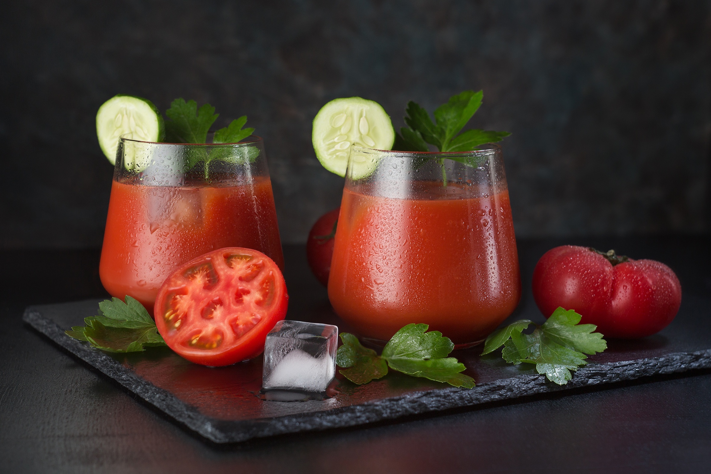 Two glasses of tomato juice with garnishes HD Wallpaper