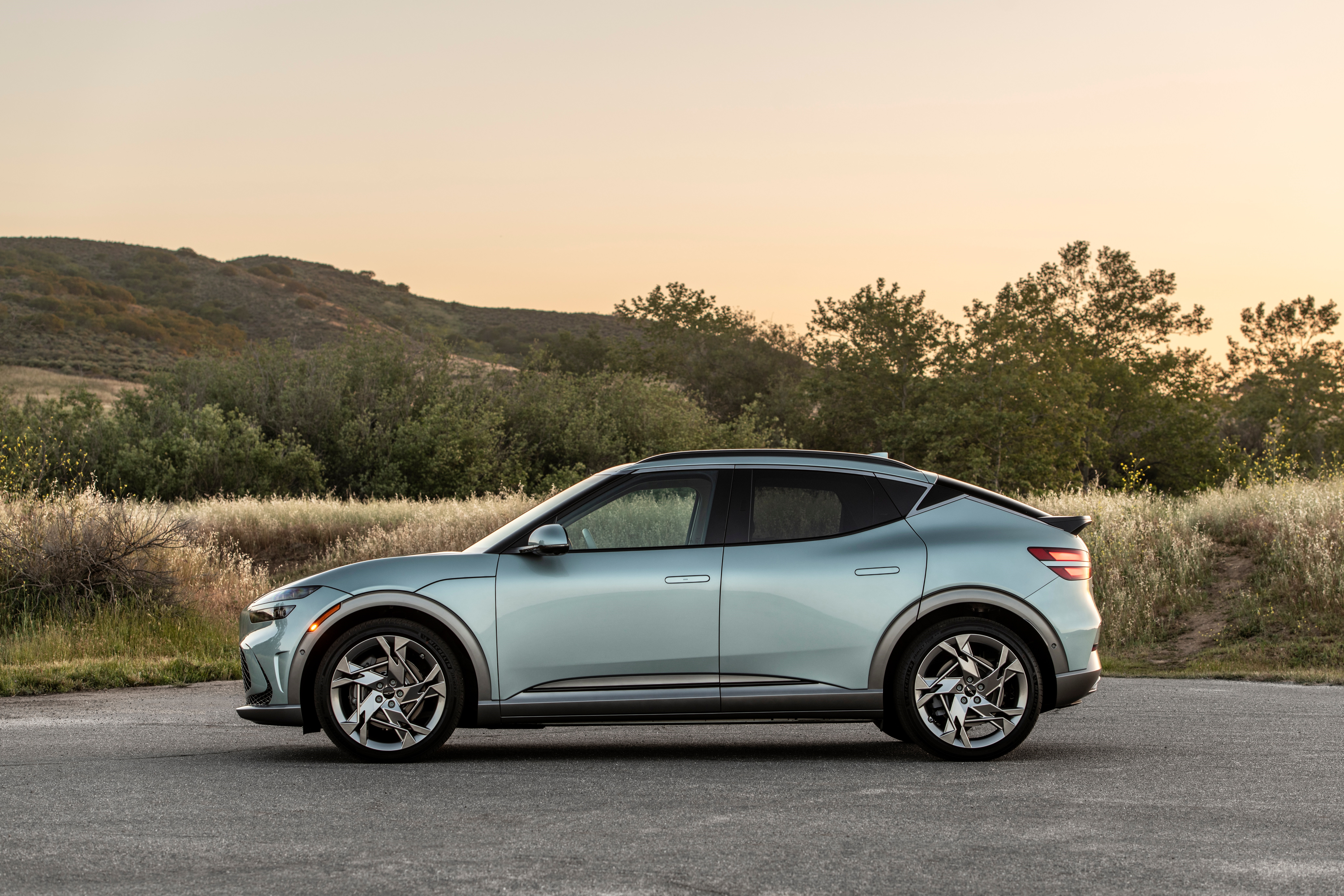 Genesis GV60 electric SUV side profile HD Wallpaper