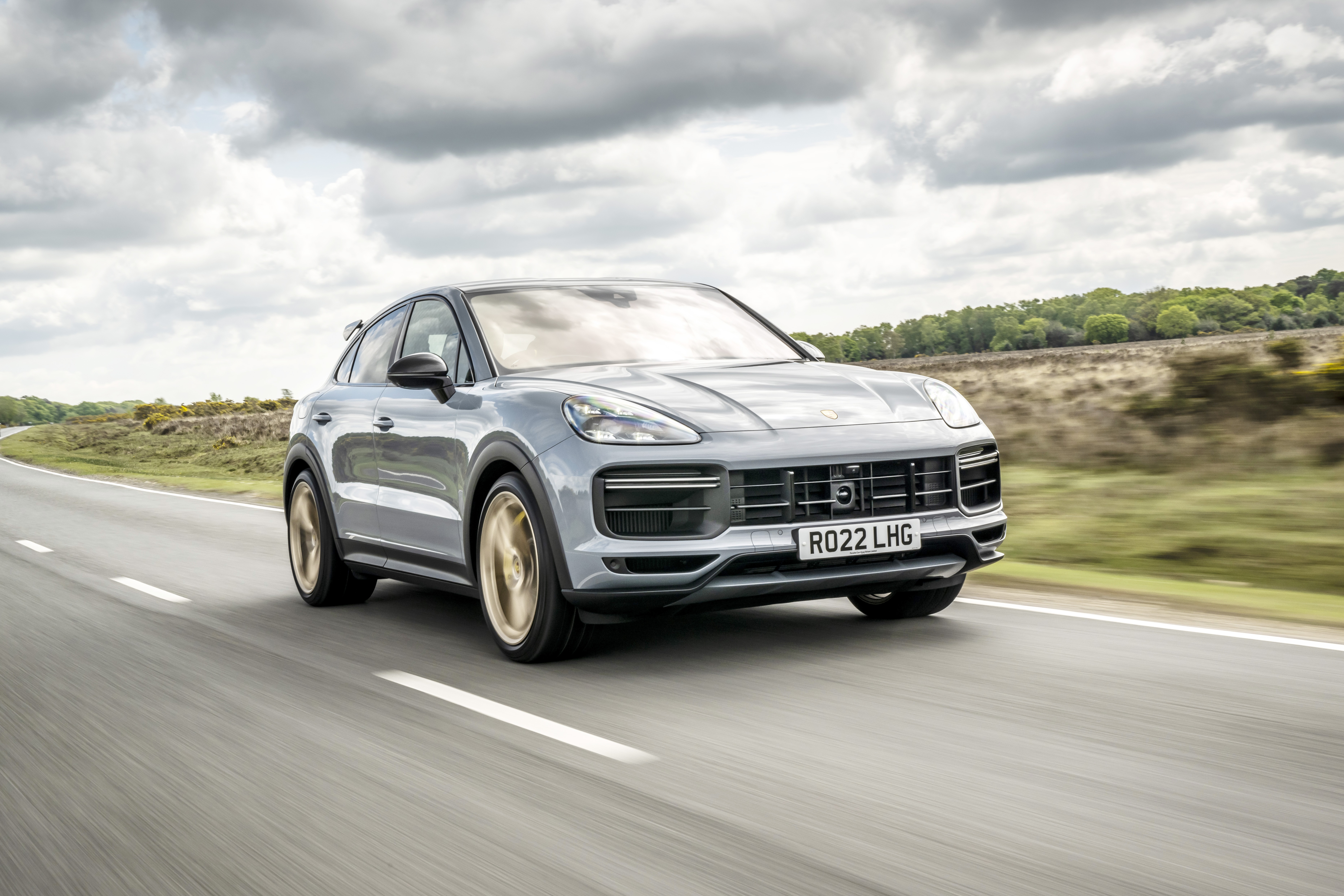 Porsche Cayenne Turbo Coupe on a road HD Wallpaper