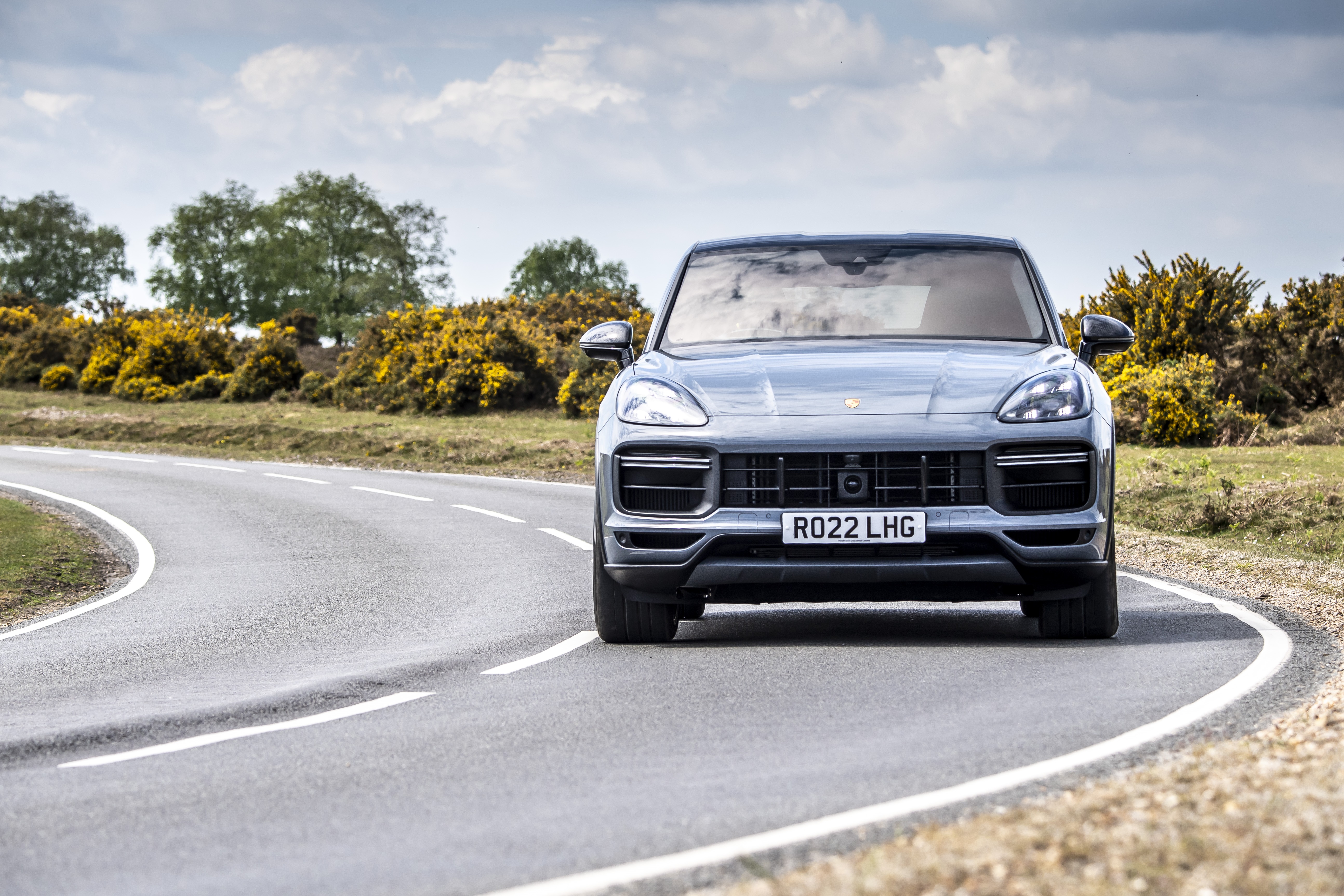 Porsche Cayenne Turbo SUV on a road HD Wallpaper