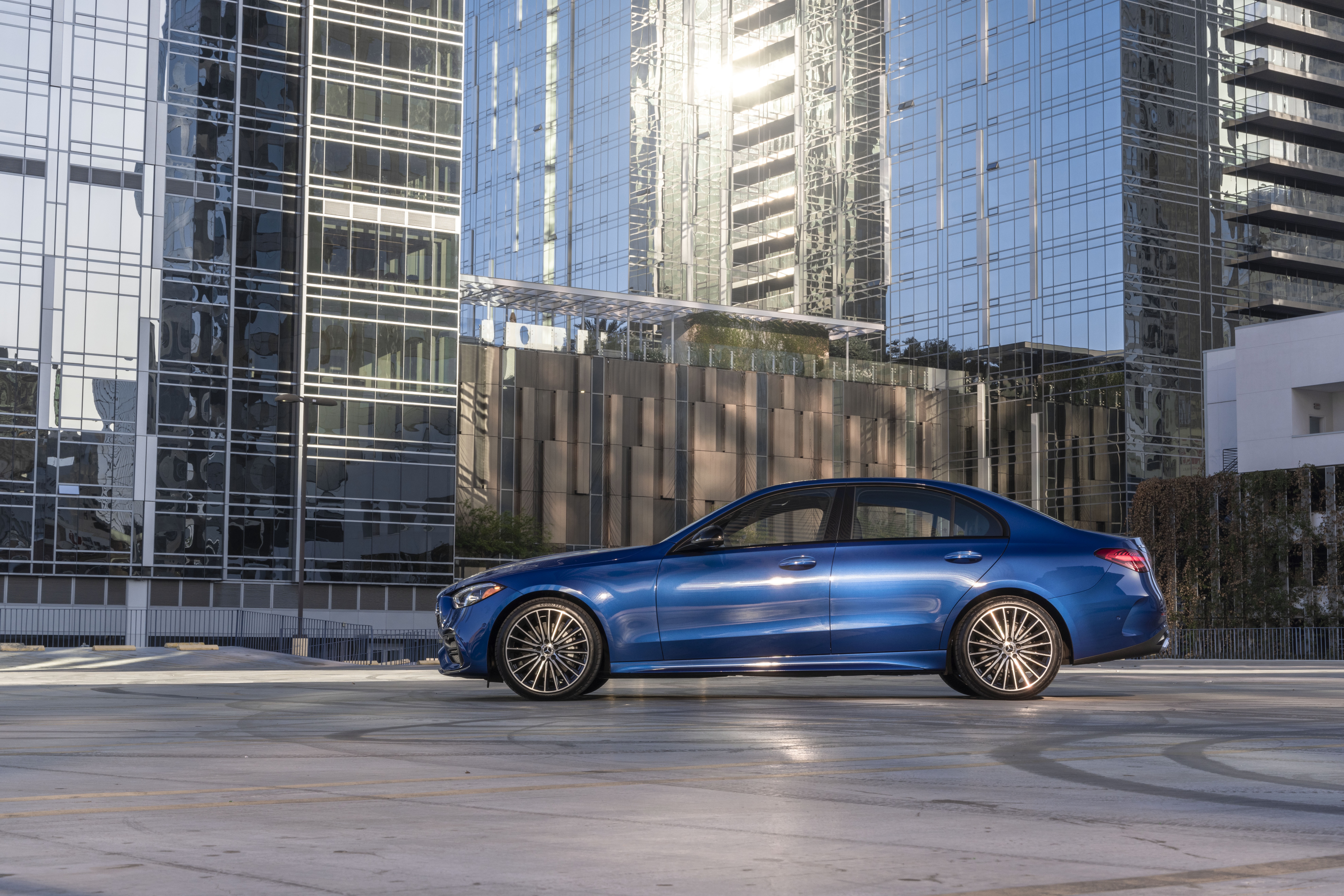 Blue Mercedes-Benz C 300 Sedan in Urban Setting HD Wallpaper