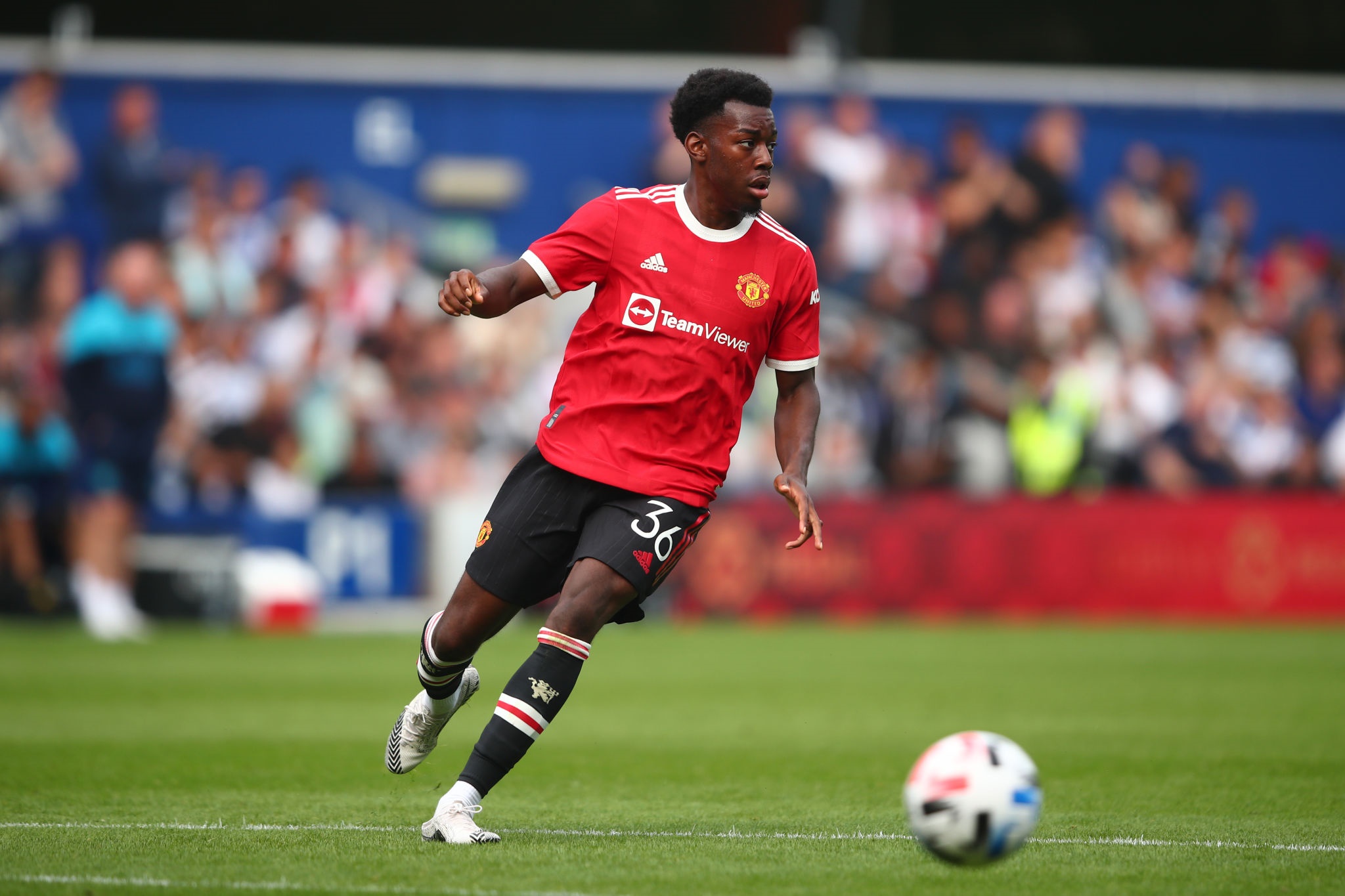 Anthony Elanga from Manchester United playing soccer HD Wallpaper