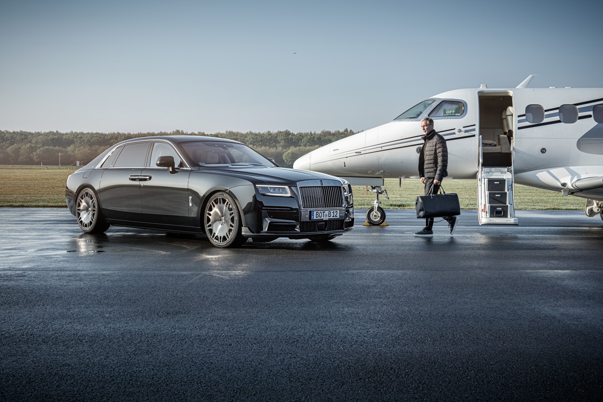 Rolls-Royce Ghost and Private Jet on Tarmac HD Wallpaper