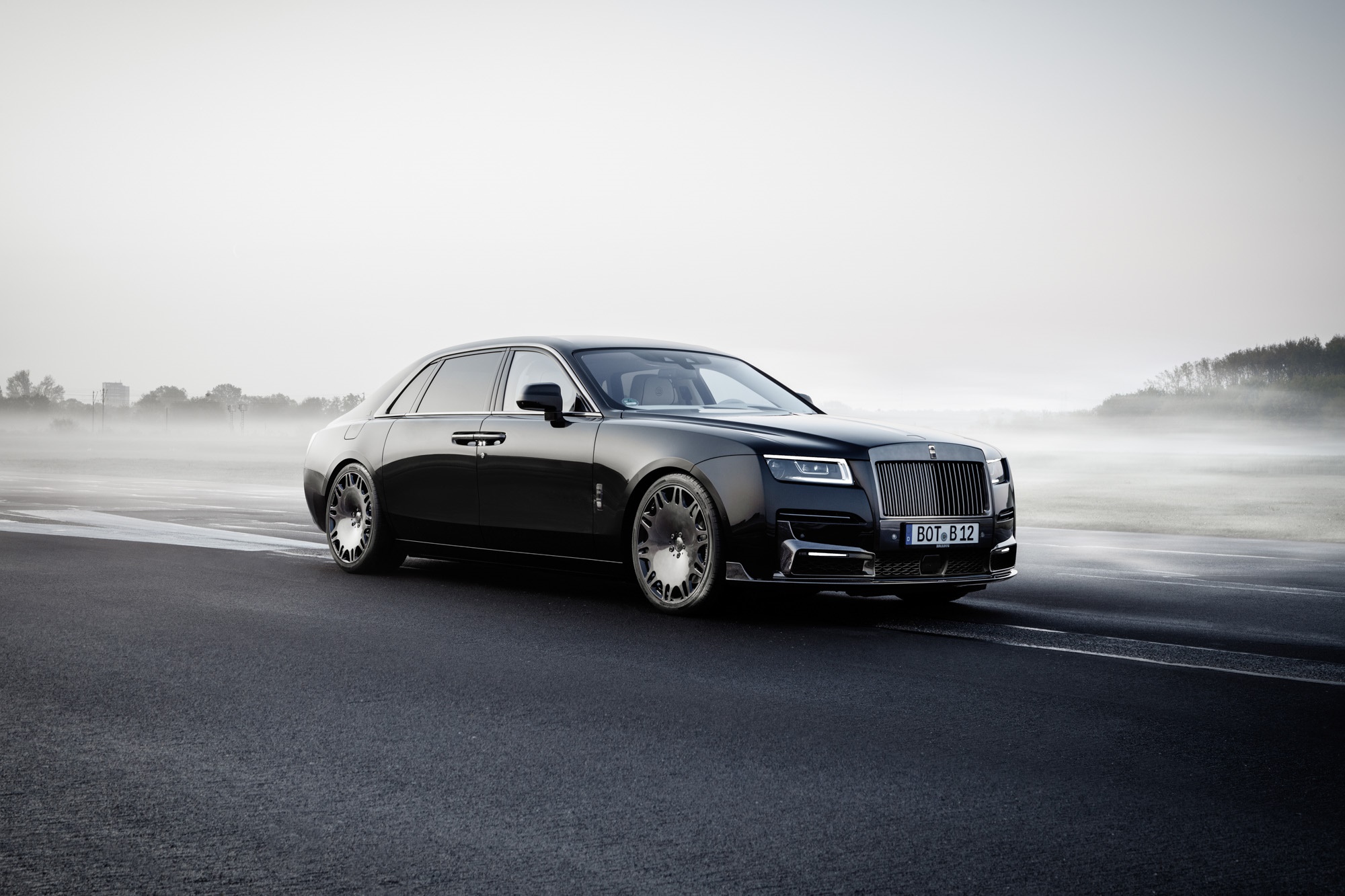 Black Rolls-Royce Ghost on a Misty Road HD Wallpaper
