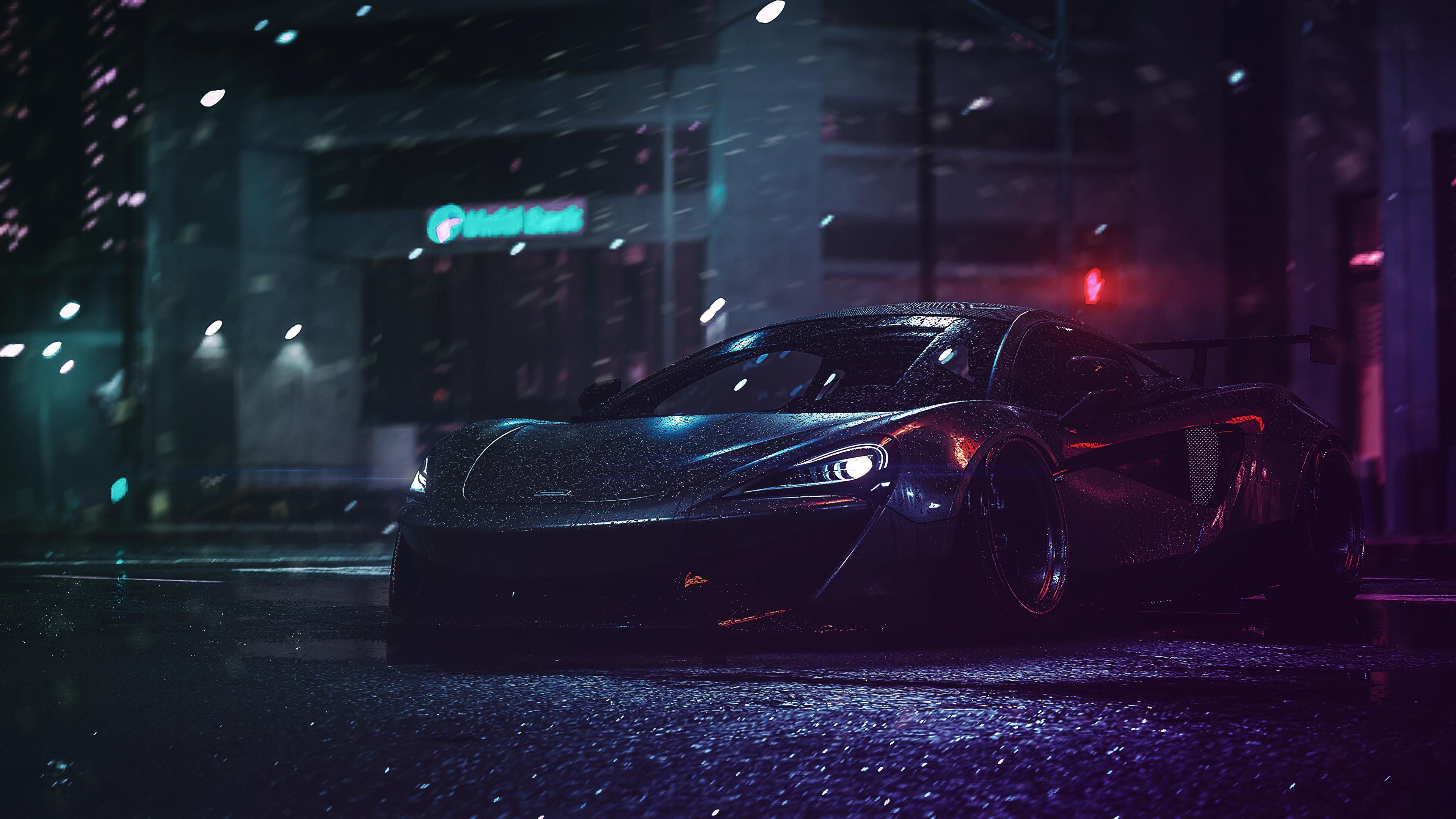 McLaren sports car on a wet city street at night HD Wallpaper