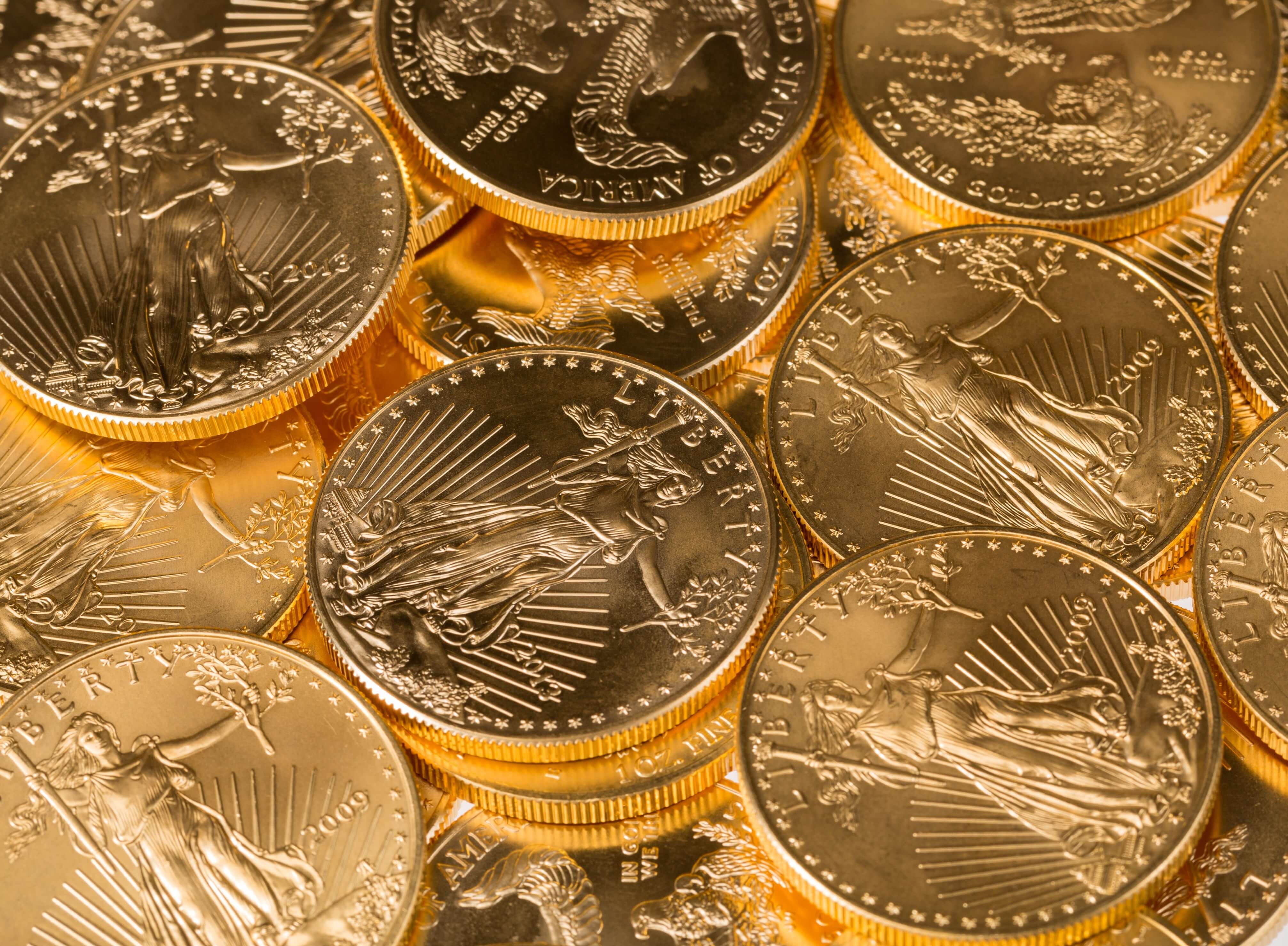 Pile of American Gold Eagle Coins HD Wallpaper