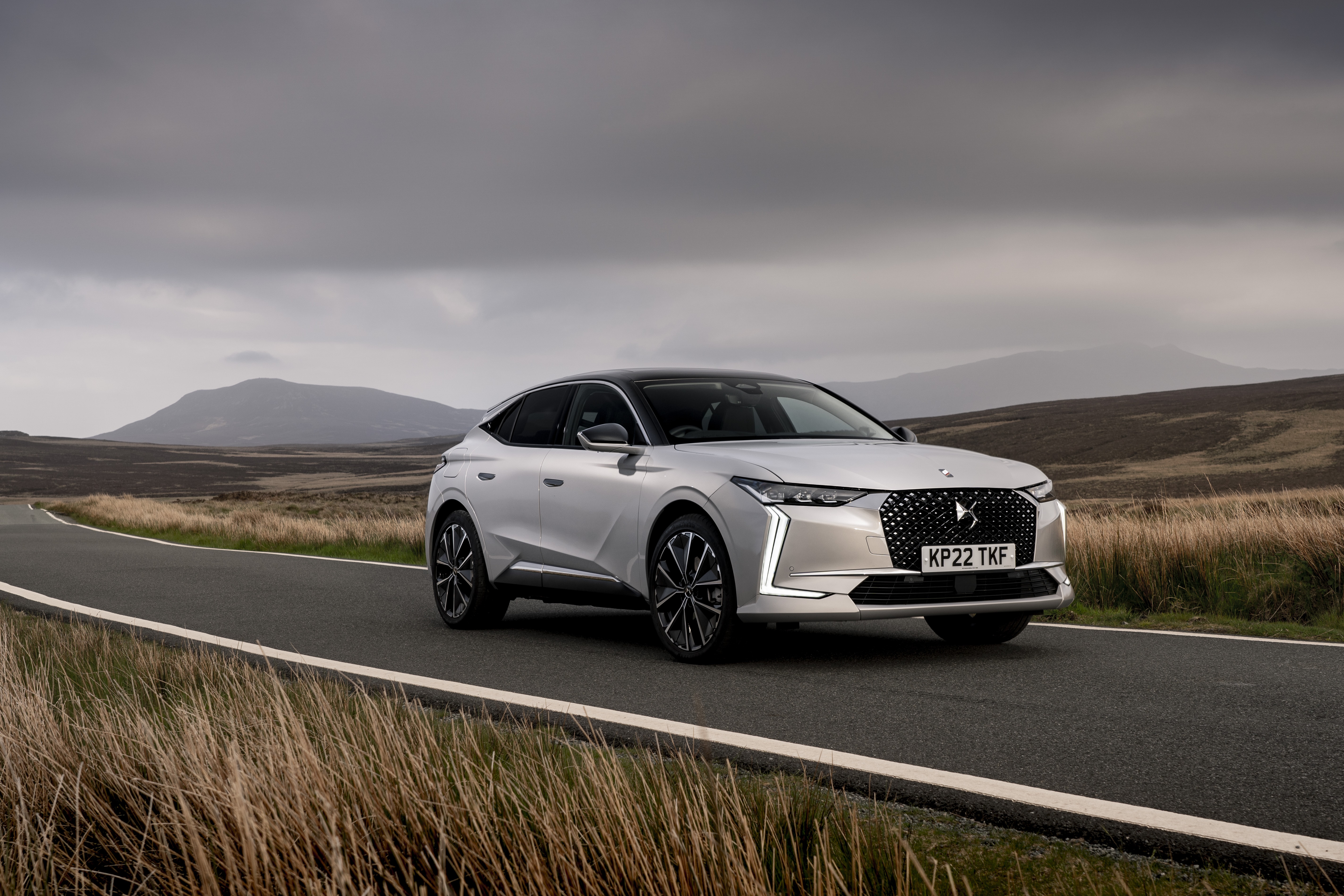 DS 4 E-Tense Rivoli driving on a road HD Wallpaper