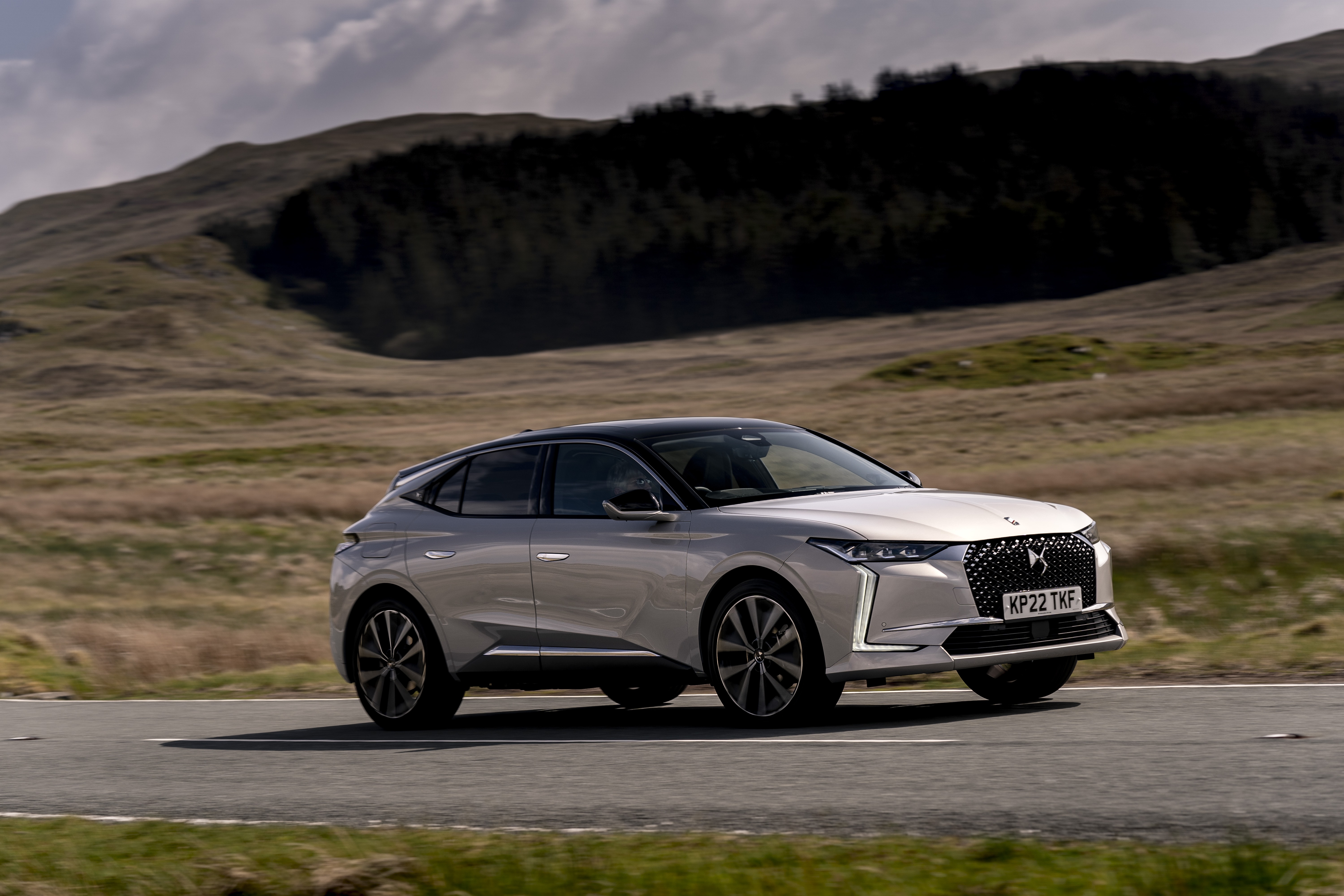 DS 4 E-Tense Rivoli driving on a road HD Wallpaper
