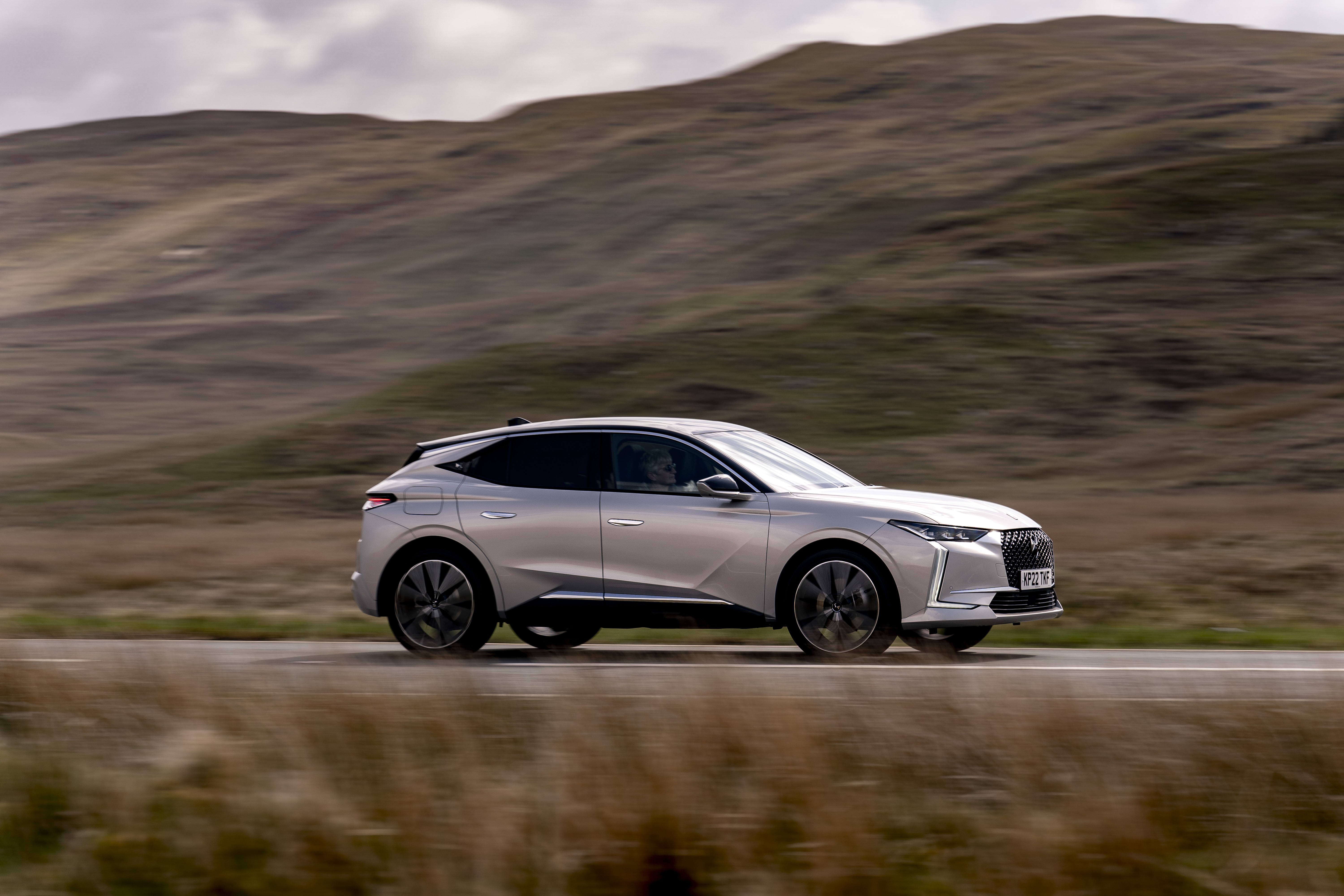 DS 4 E-Tense Rivoli driving on a road HD Wallpaper