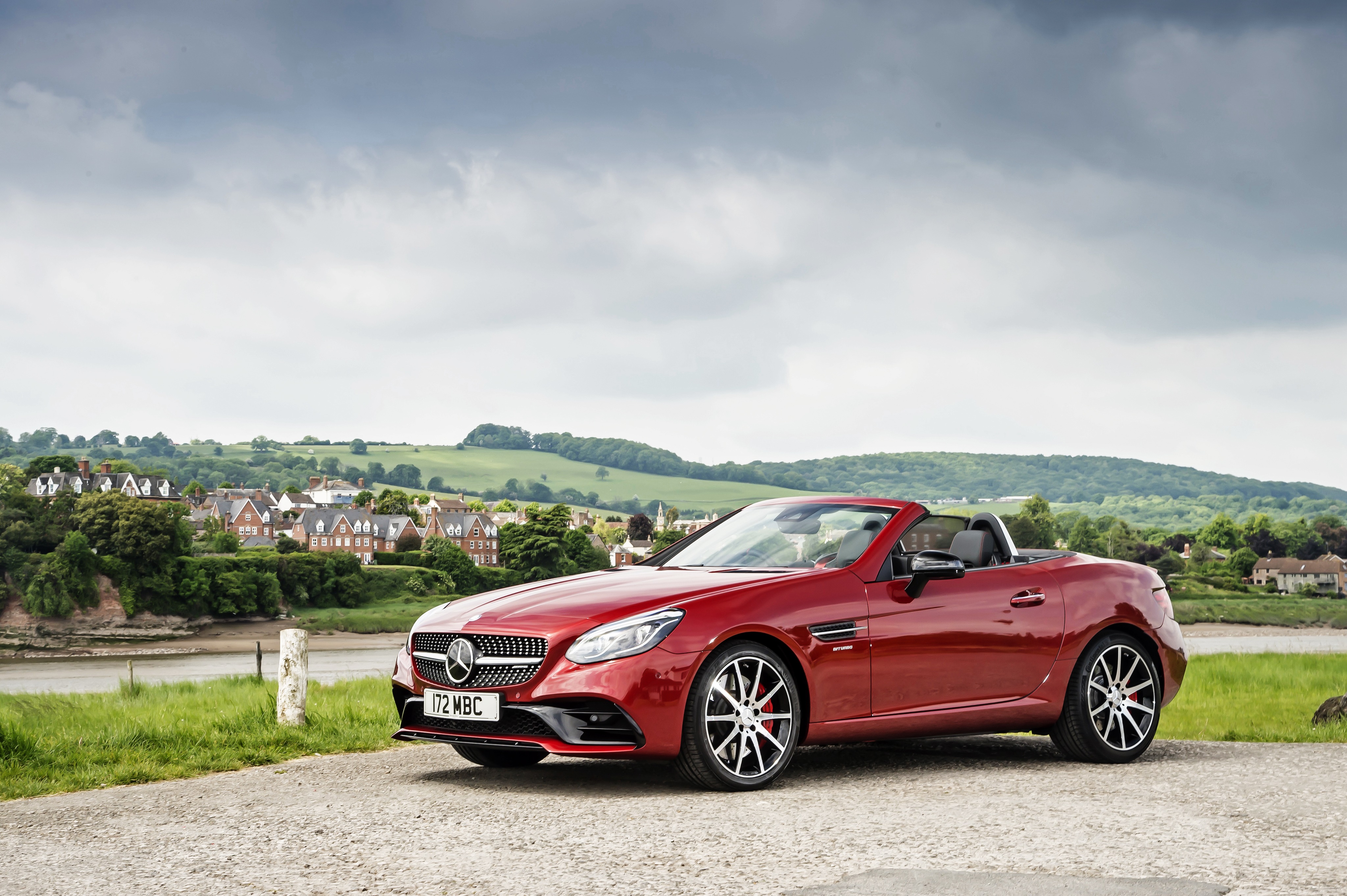 Red Mercedes-Benz SLK Convertible on a Coastal Road HD Wallpaper