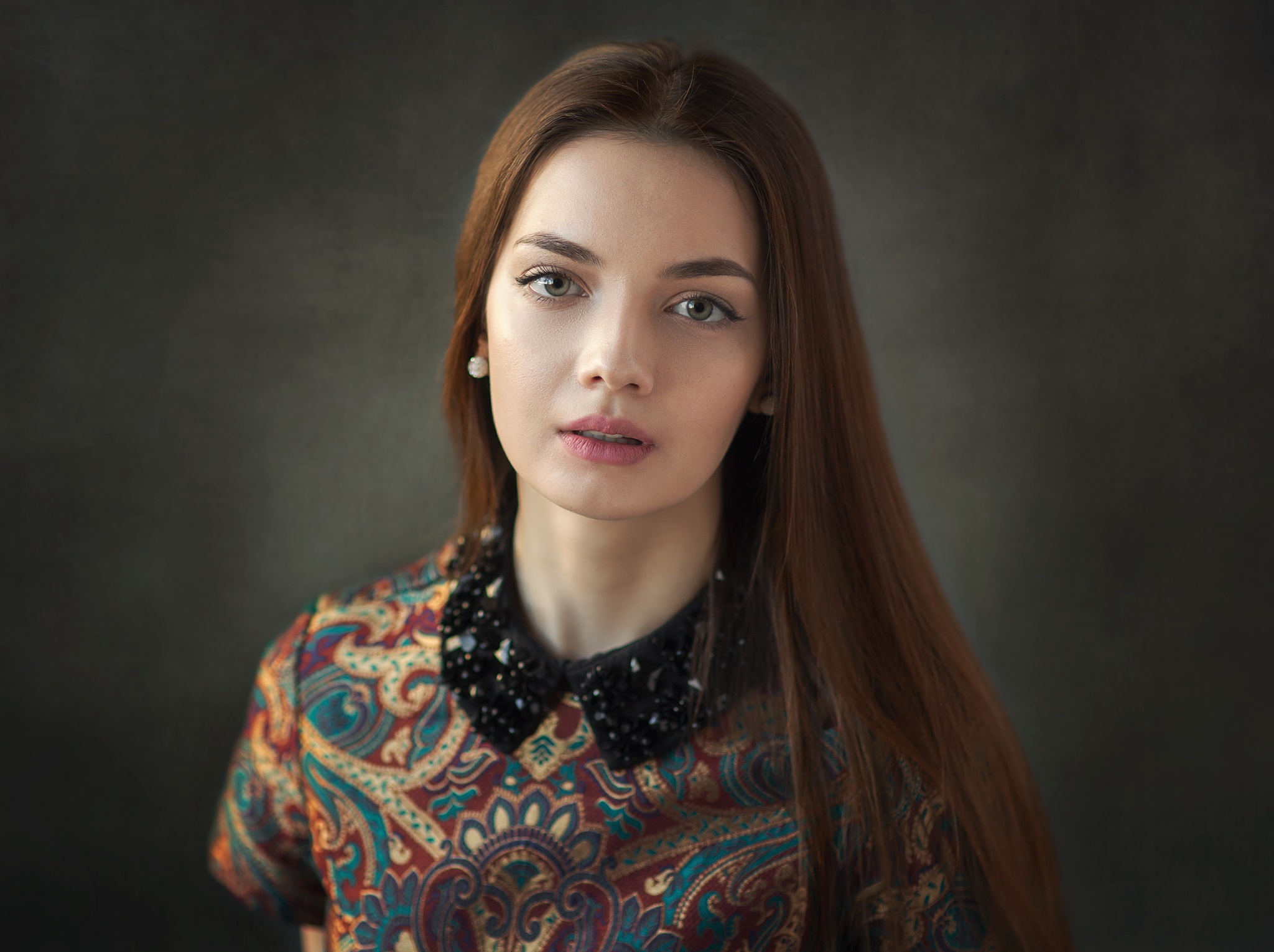Woman with long brown hair and patterned dress HD Wallpaper