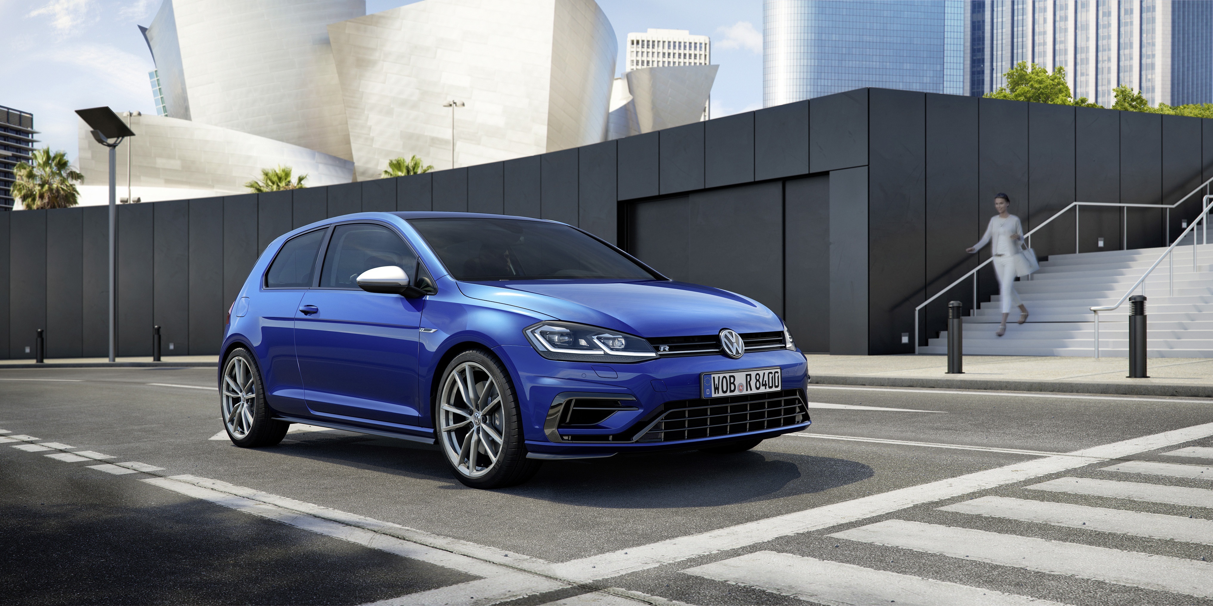 Blue Volkswagen Golf R parked on street HD Wallpaper
