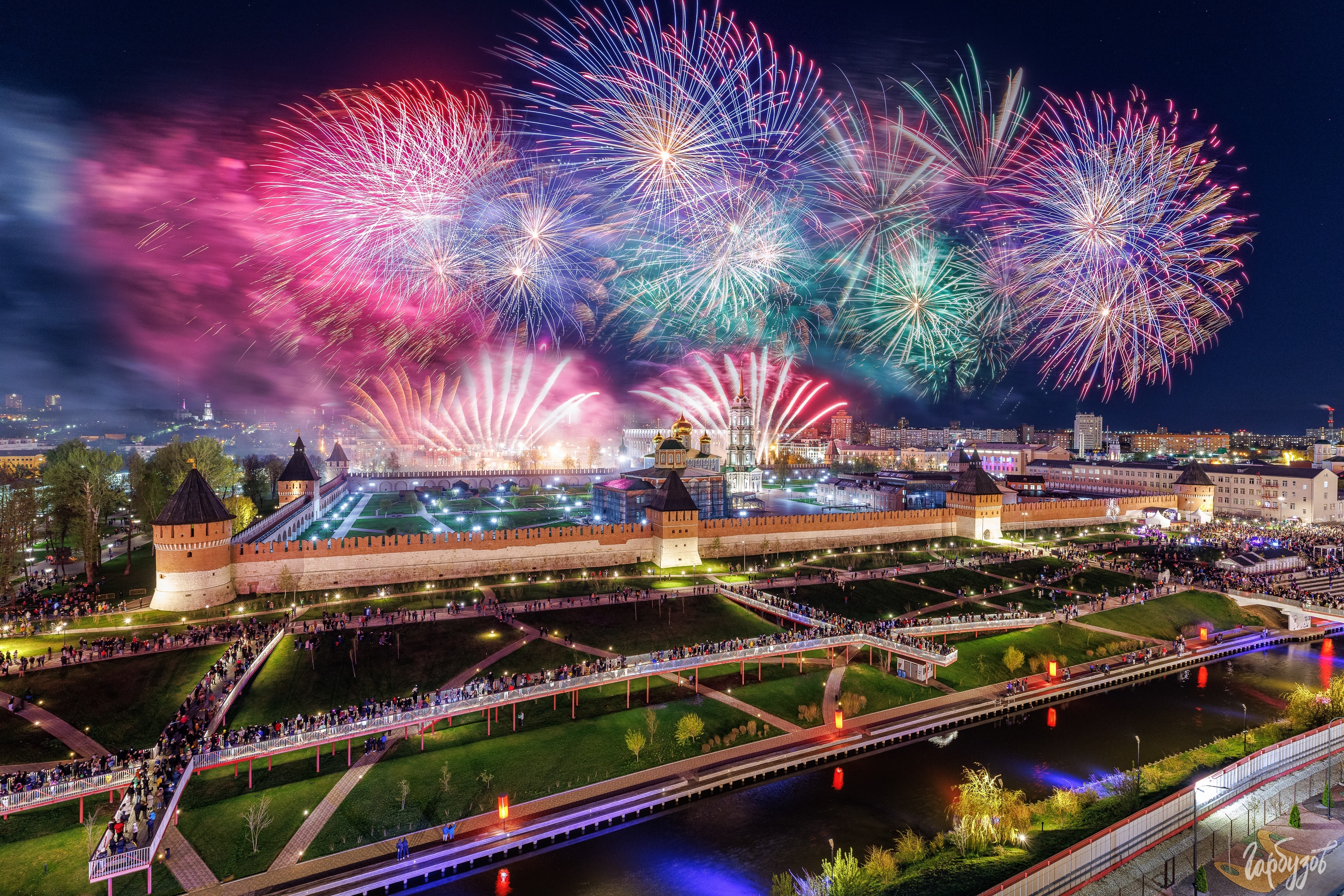Fireworks over a historic fortress and city at night HD Wallpaper