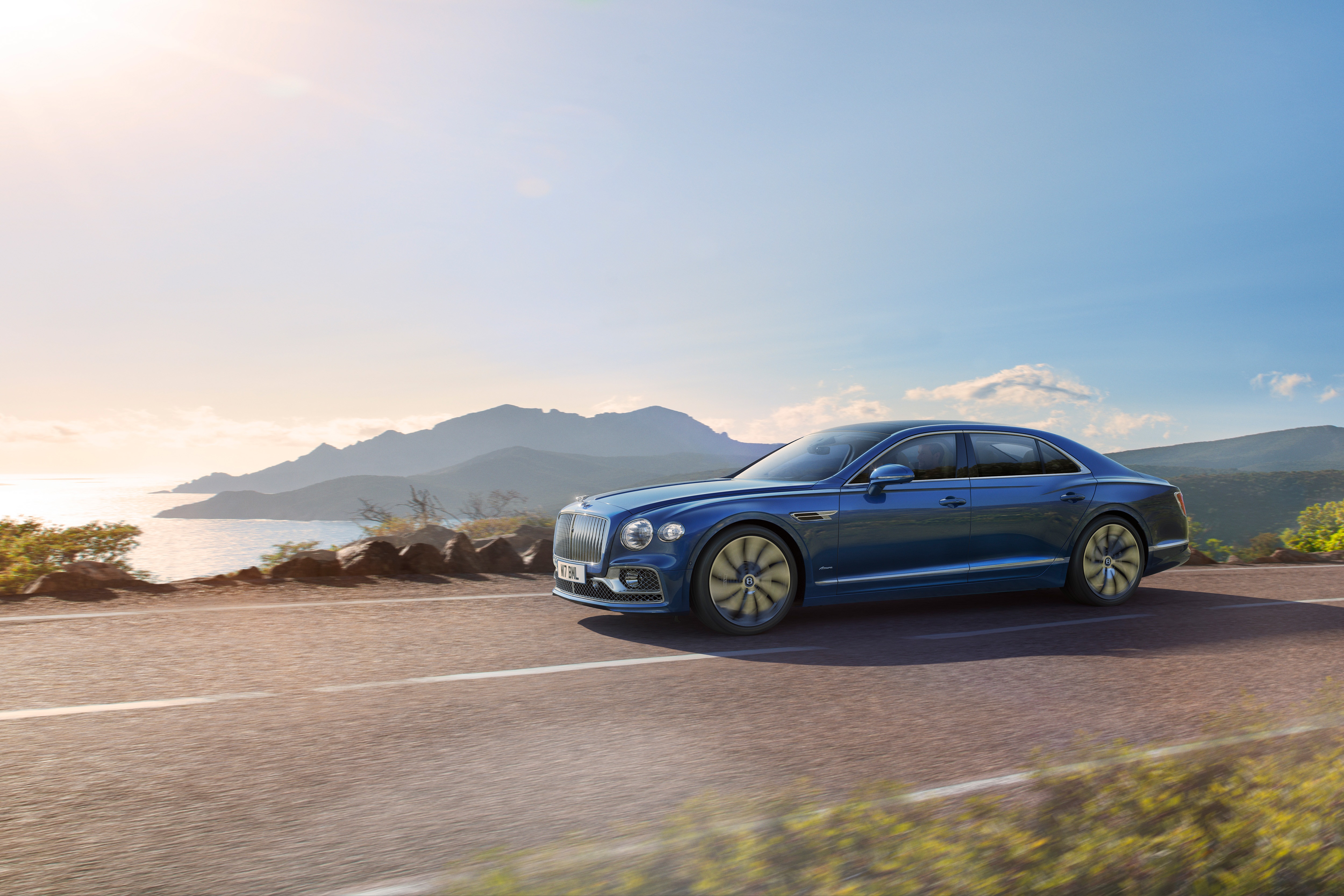 Bentley Flying Spur Azure on a Coastal Road HD Wallpaper