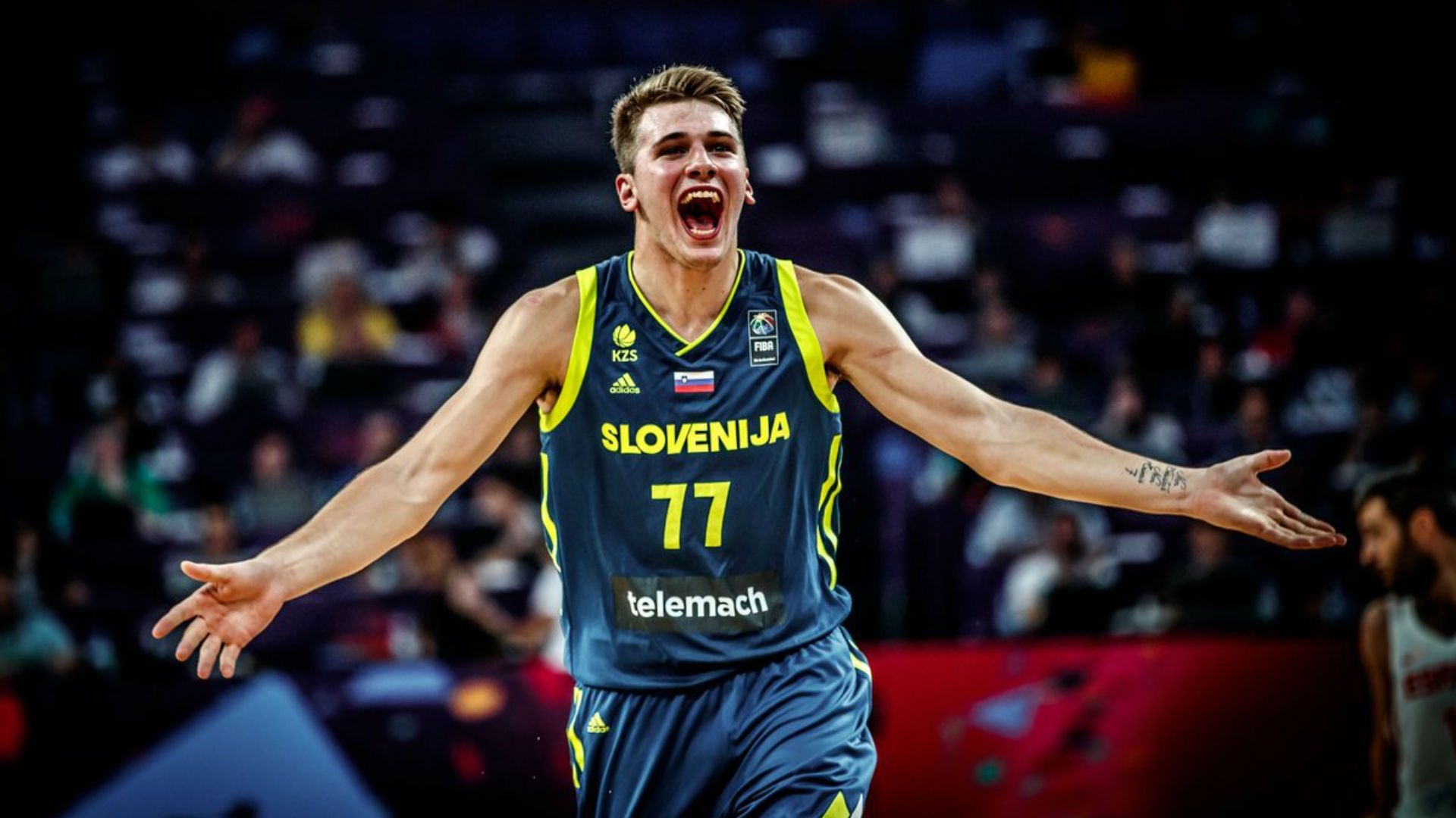 Luka Dončić playing basketball for Slovenia HD Wallpaper