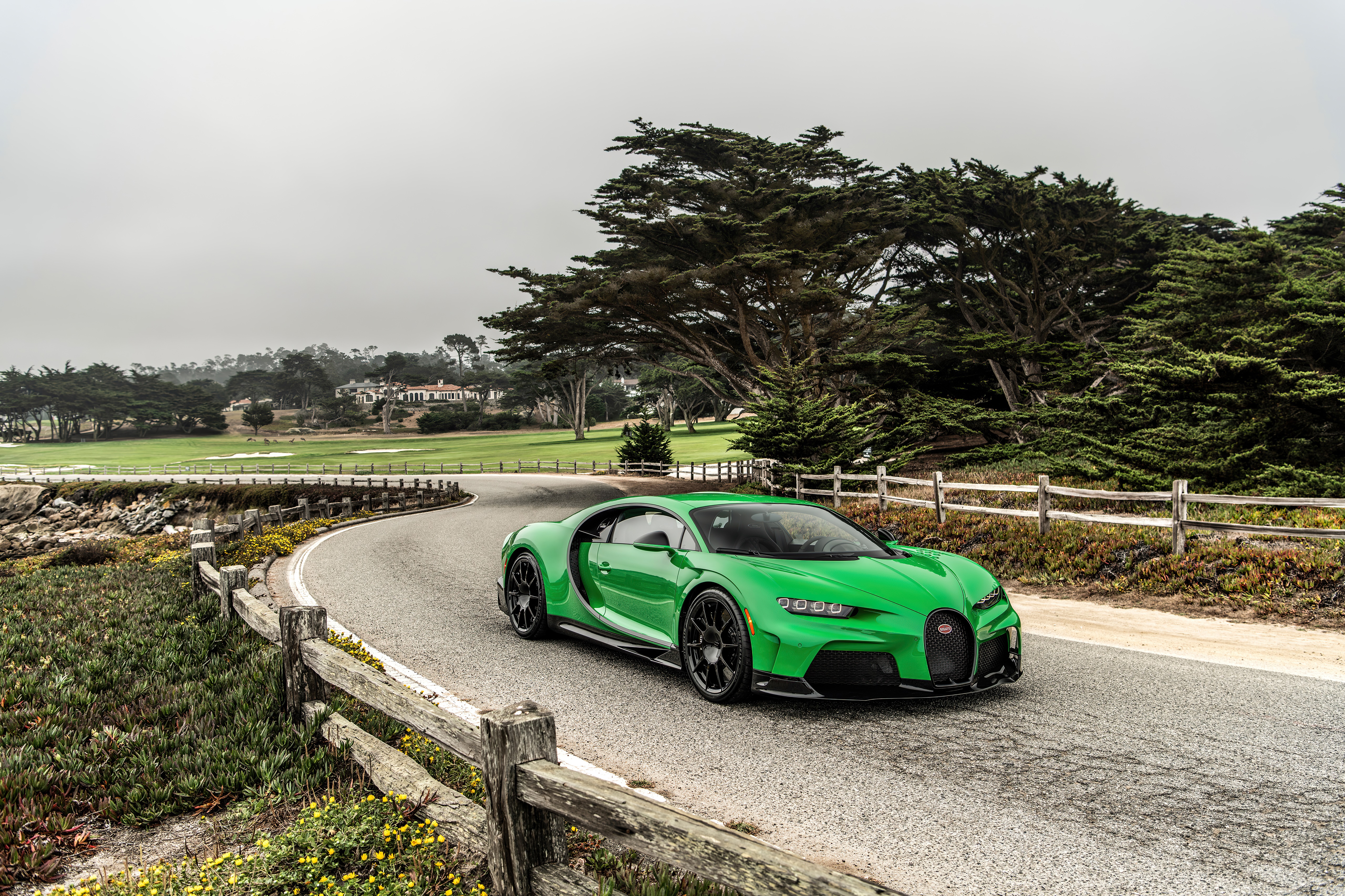 Green Bugatti Chiron on a Coastal Road HD Wallpaper
