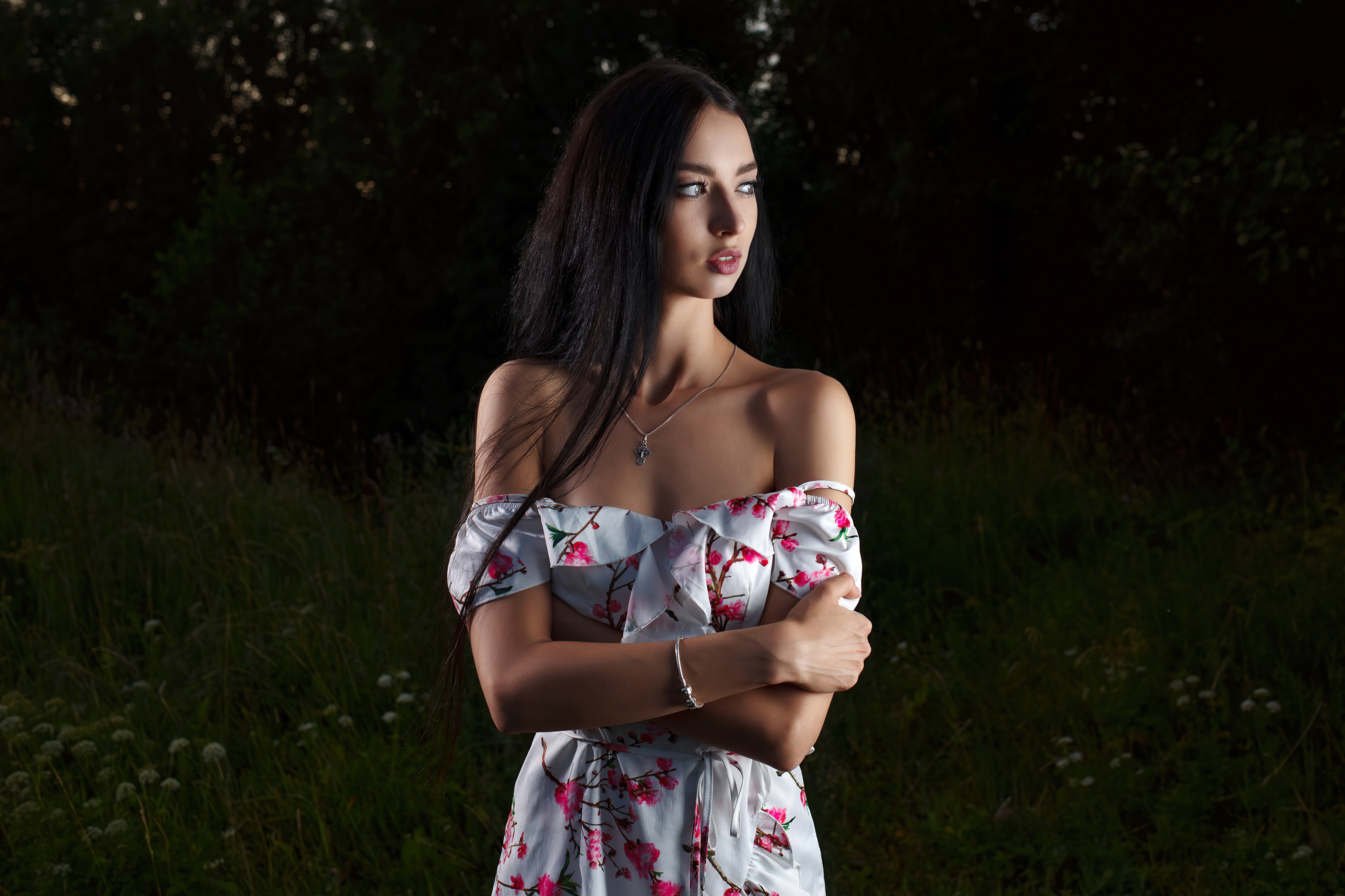 Brunette model in an elegant floral dress HD Wallpaper