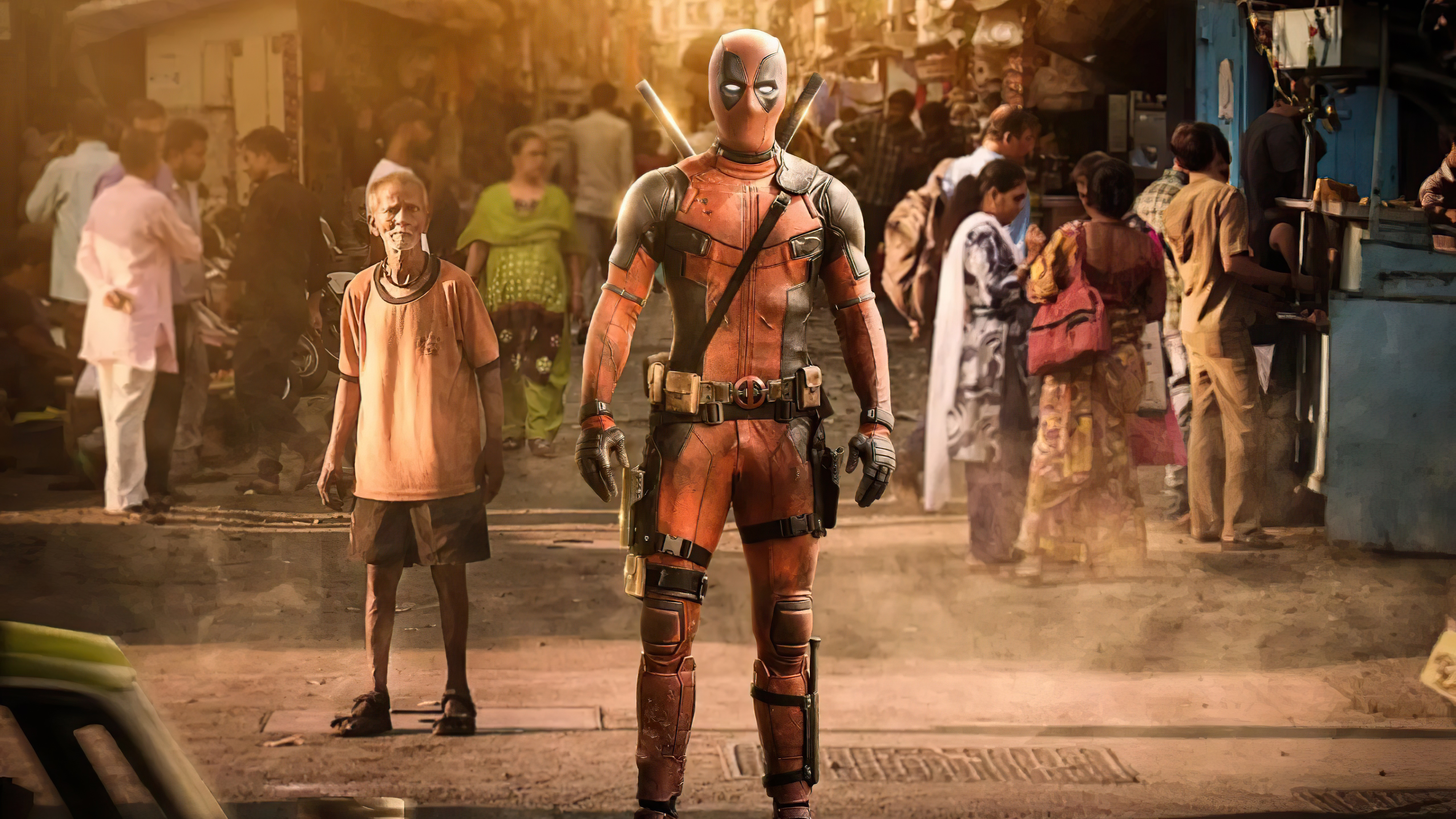 Deadpool in a busy street with people HD Wallpaper