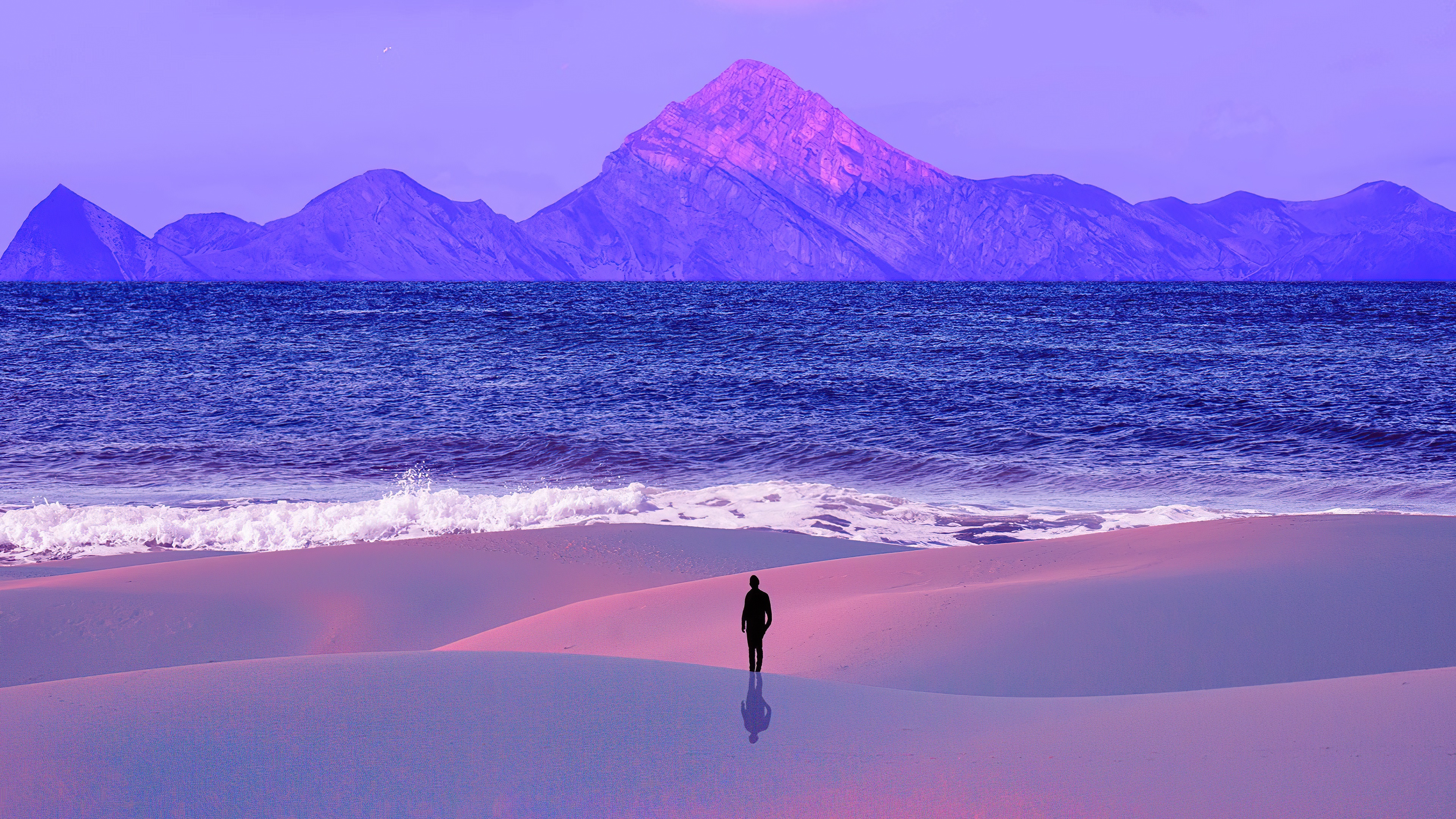 Man on a purple beach with mountains and ocean HD Wallpaper