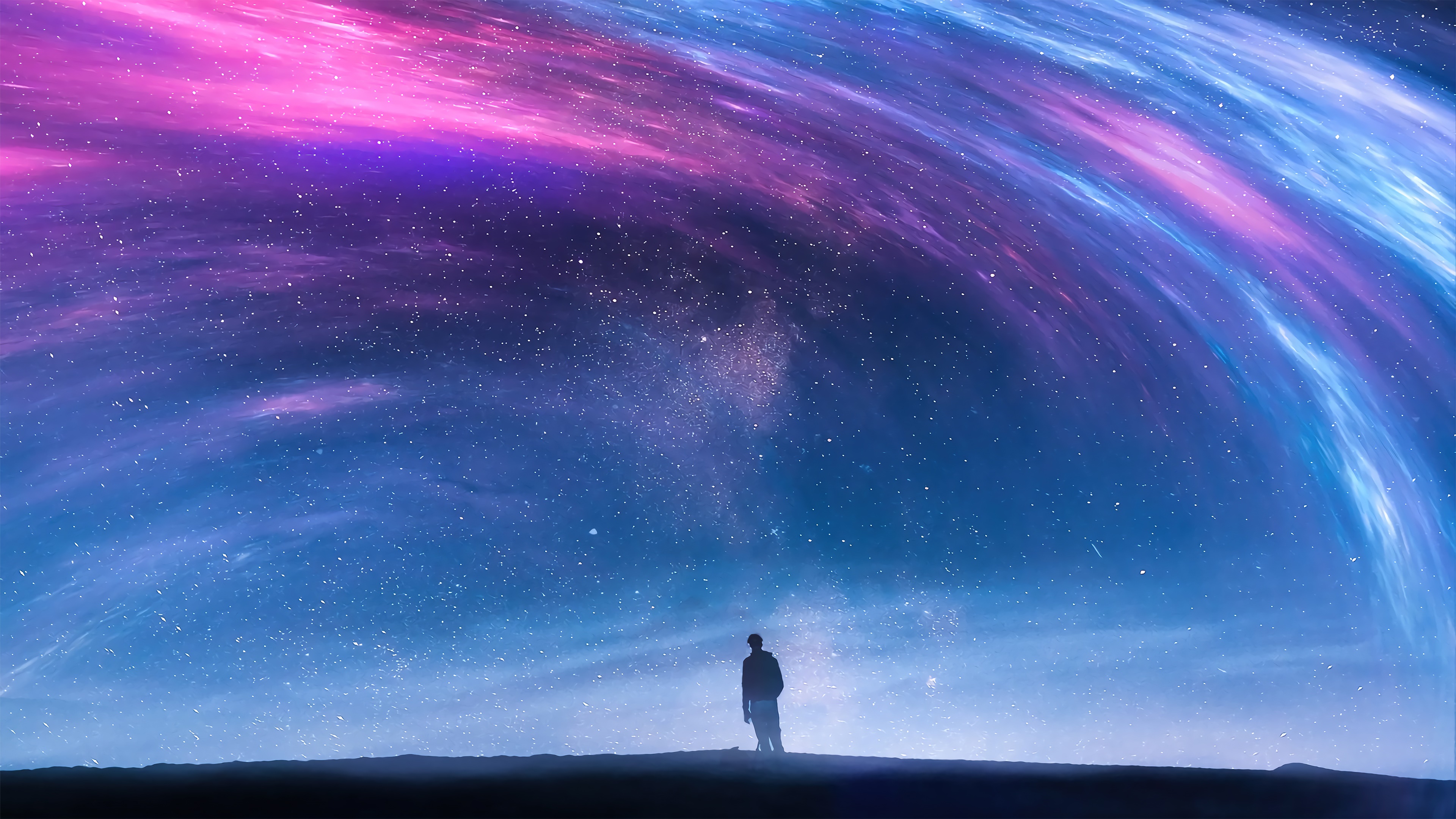 Man standing under a colorful nebula 4K HD Wallpaper