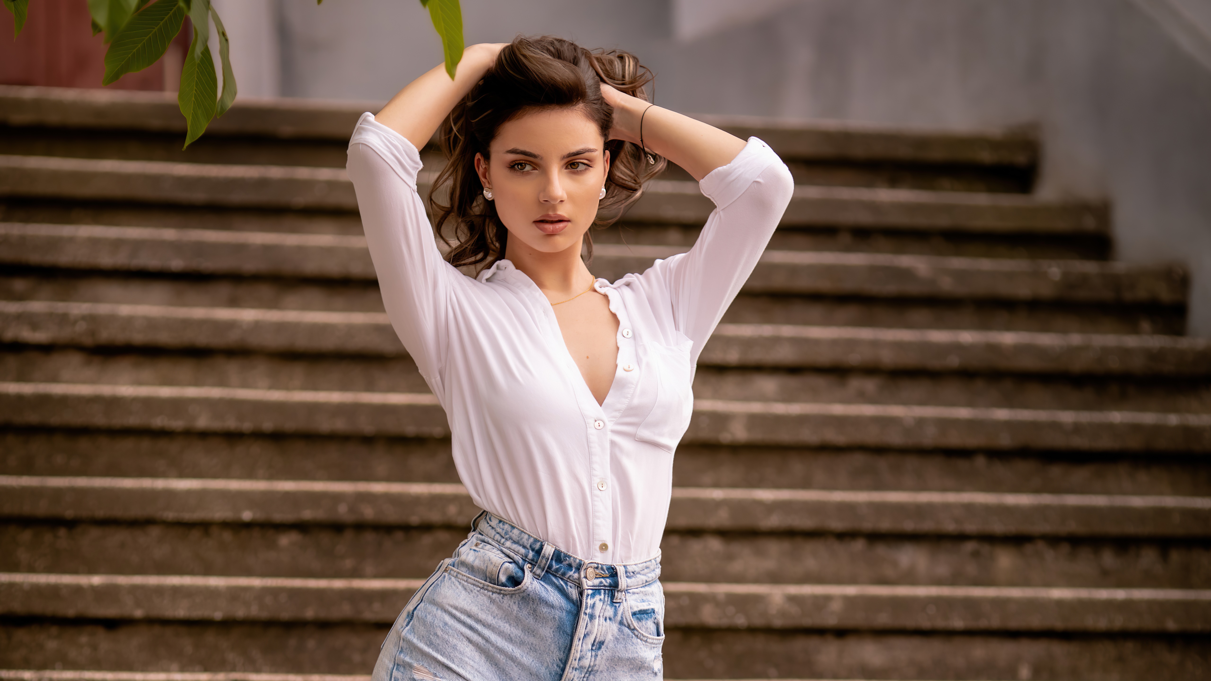 Woman in white shirt and denim shorts on stairs HD Wallpaper