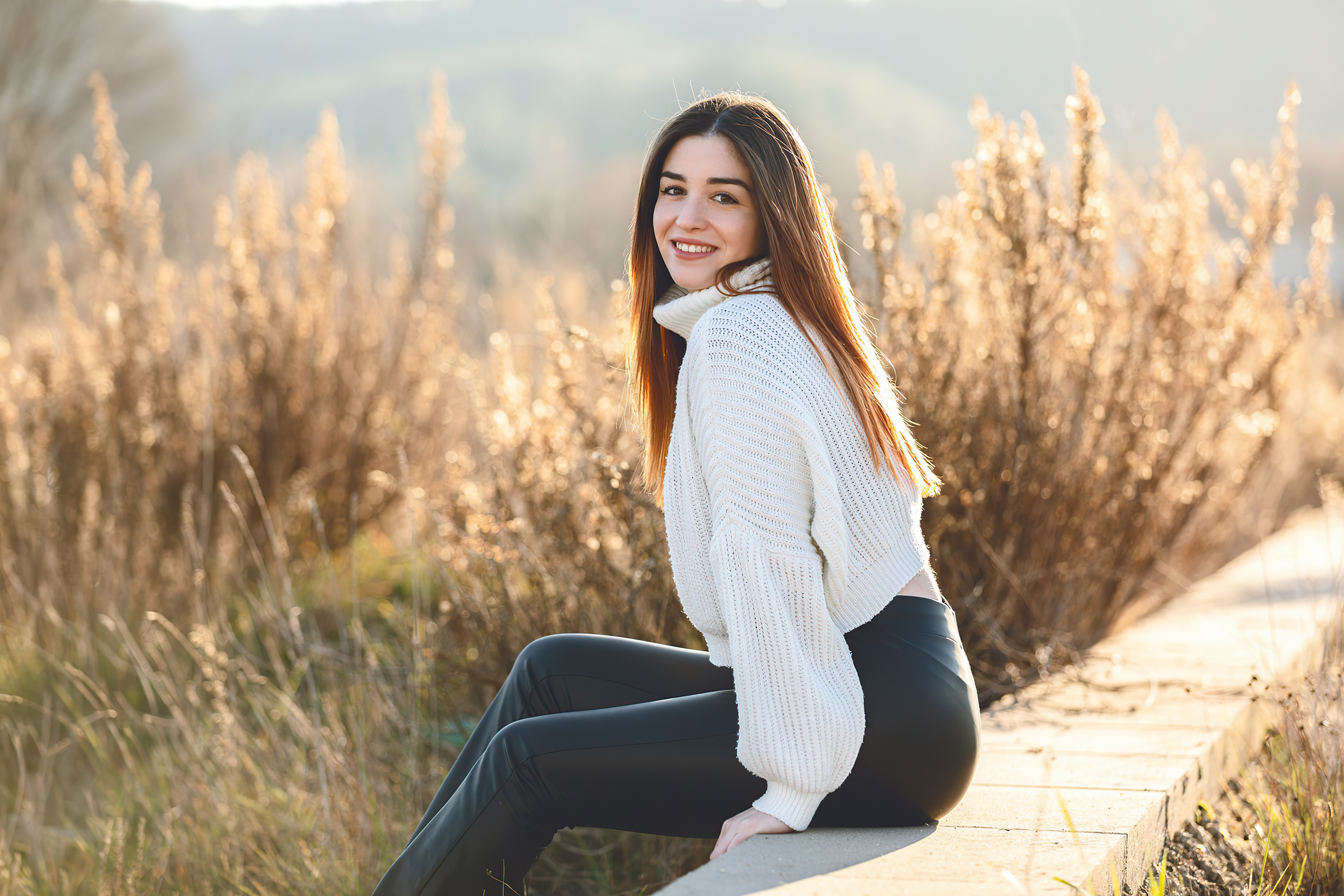 Girl in white sweater and black pants HD Wallpaper