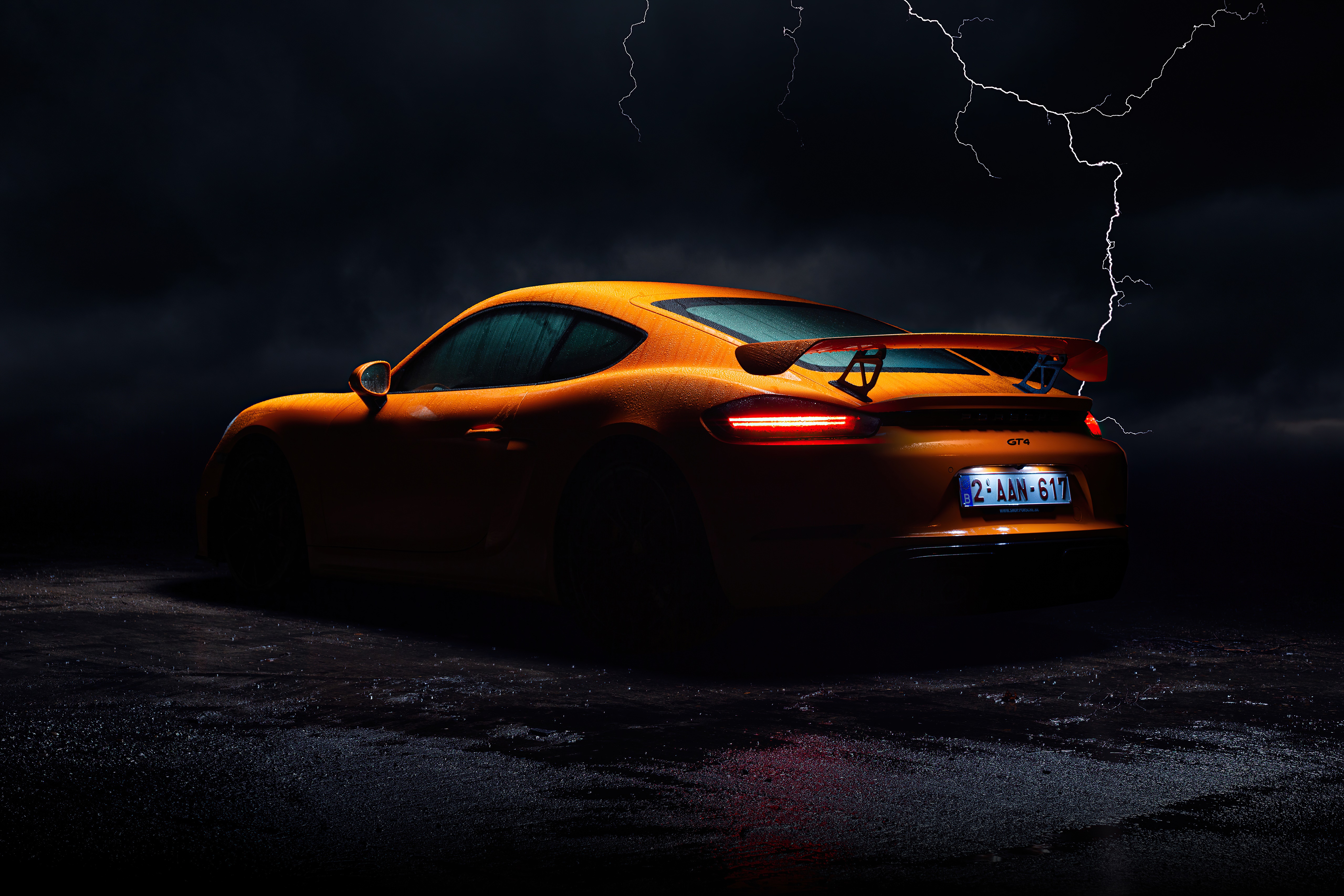 Orange Porsche Cayman GT4 with Lightning HD Wallpaper