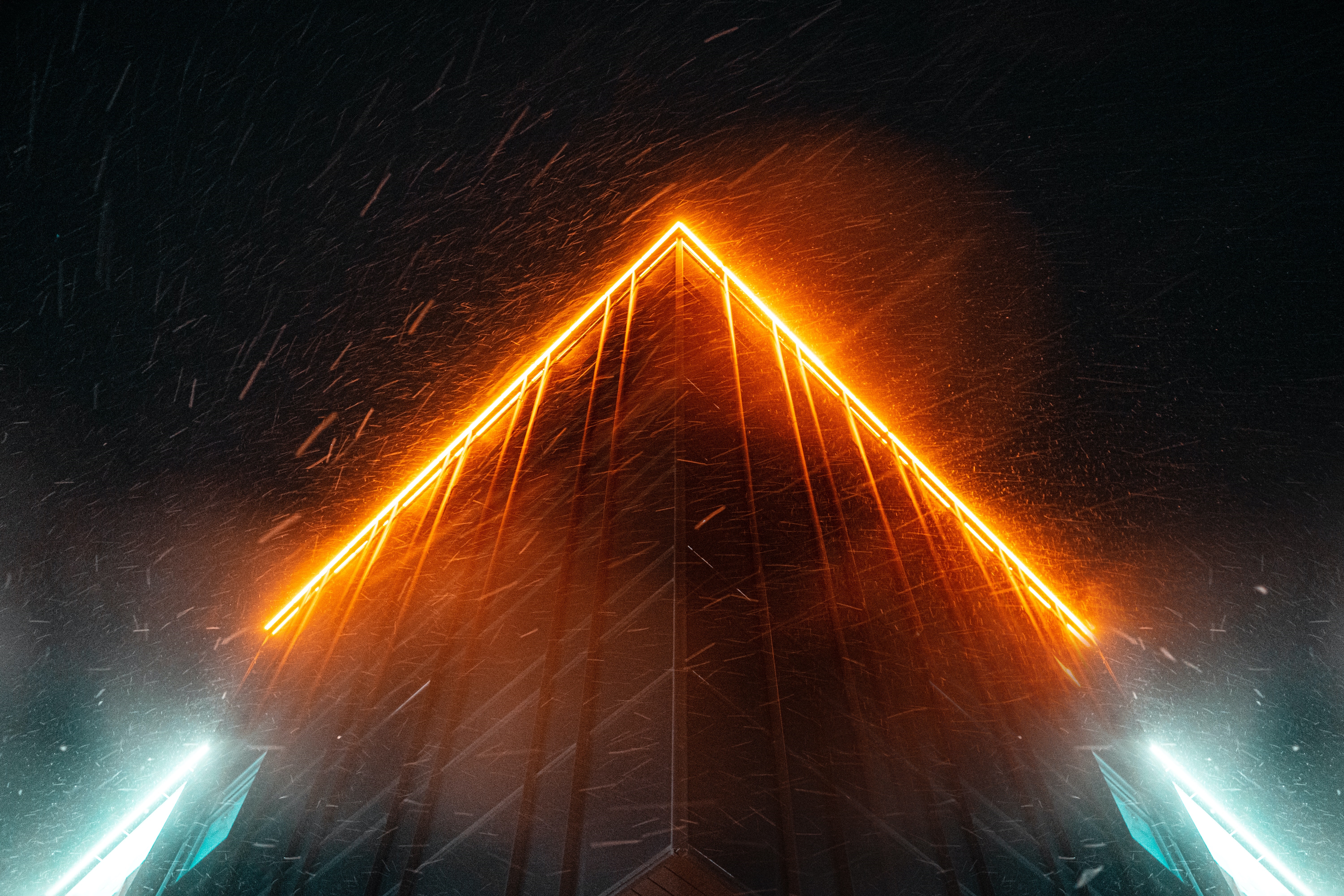Neon lights on a building in the snow HD Wallpaper