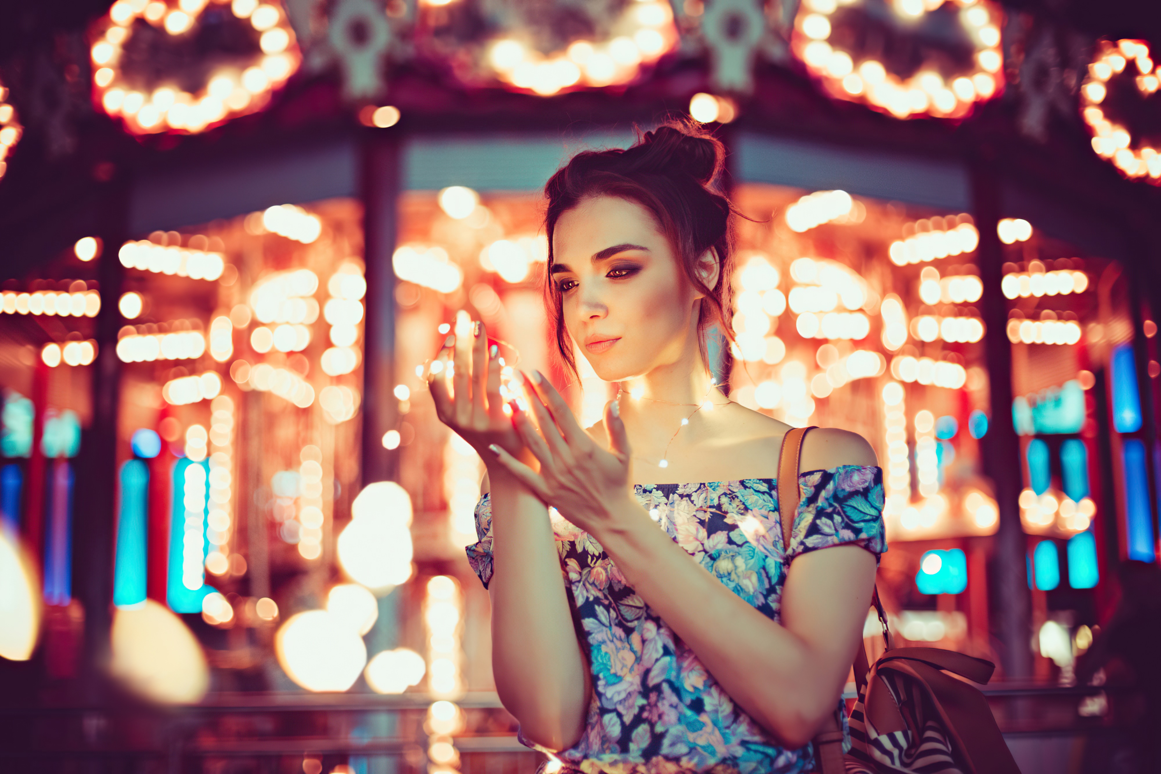 Girl with fairy lights at amusement park HD Wallpaper