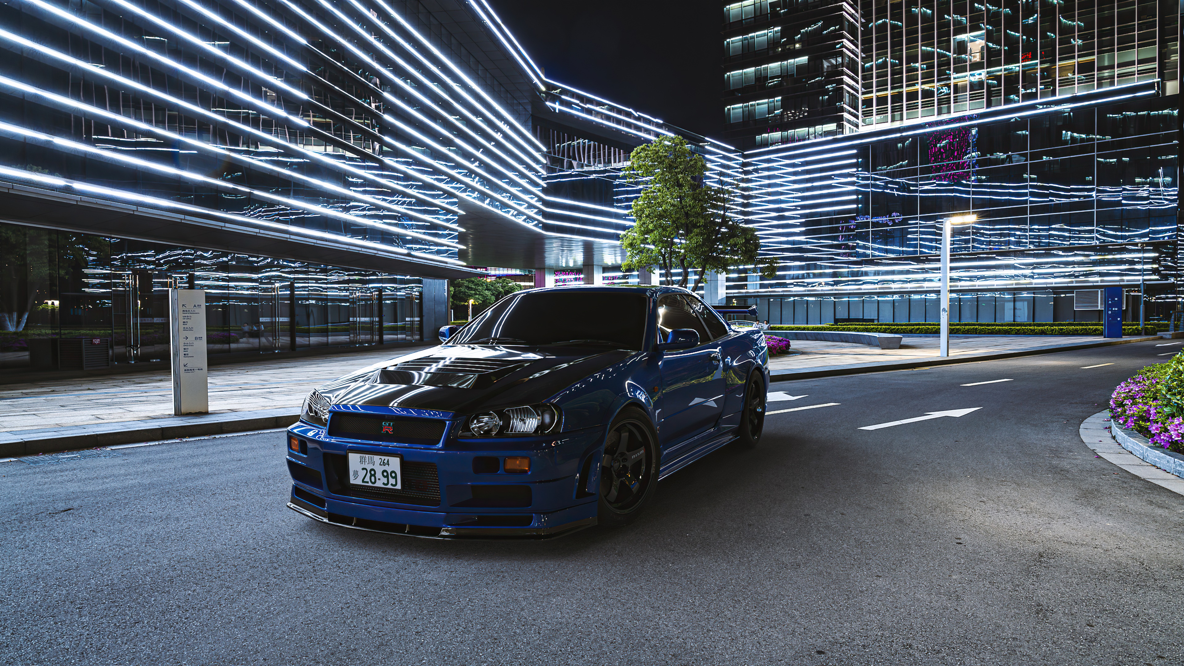 Blue Nissan GT-R R34 parked at night HD Wallpaper