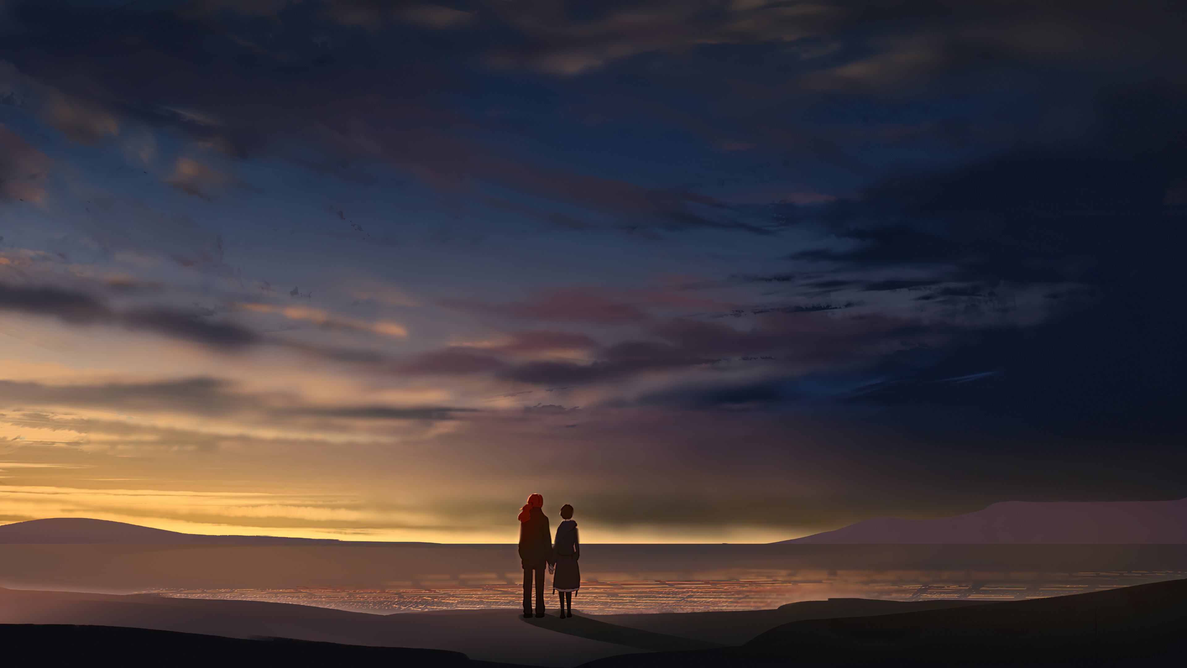 Two figures on a beach at sunset HD Wallpaper