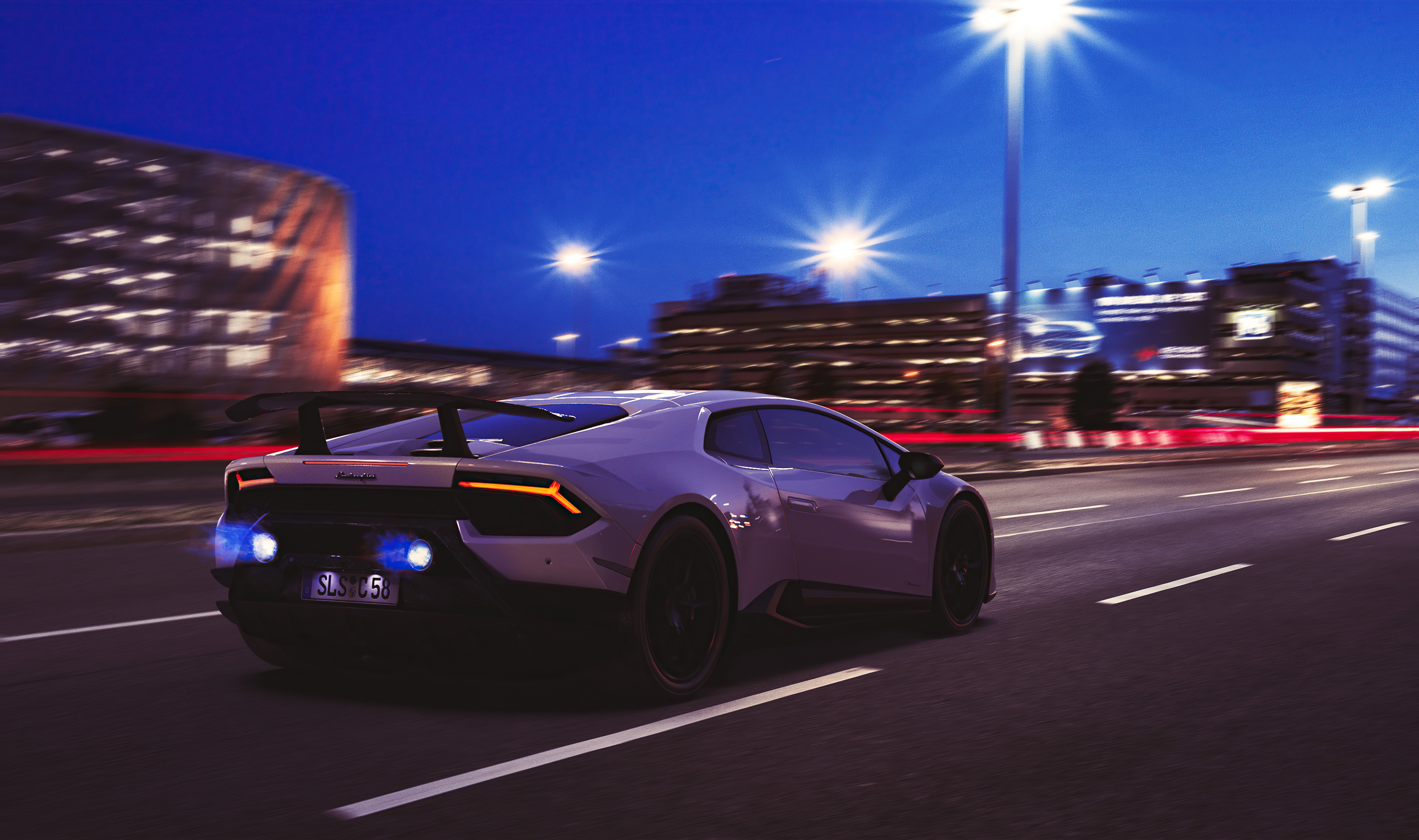 Lamborghini Huracan Performante driving at night HD Wallpaper
