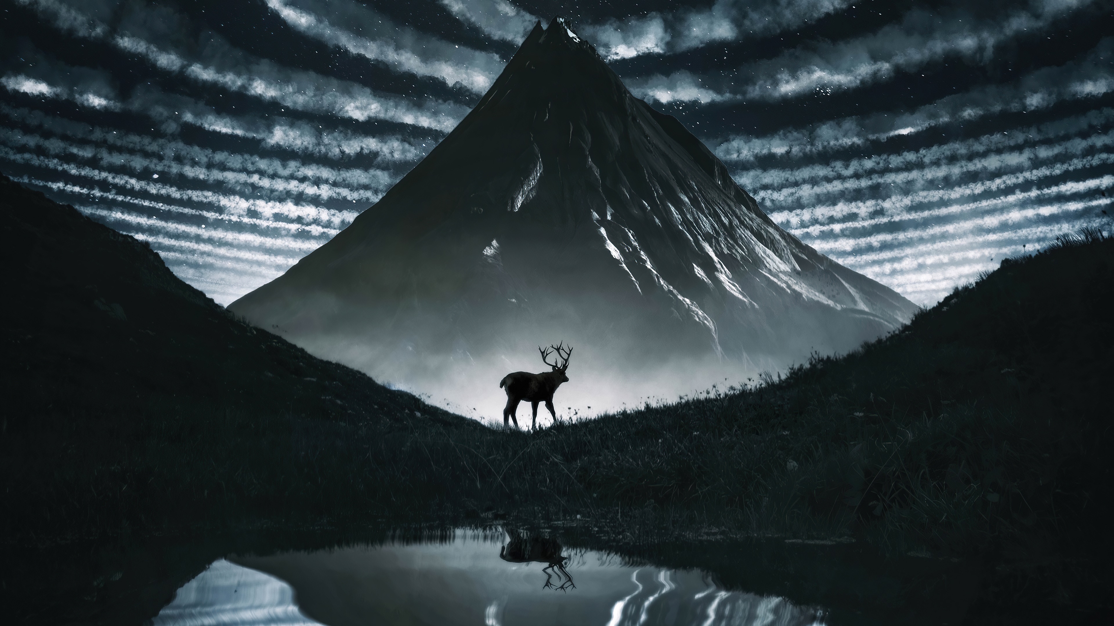 Reindeer in front of a mountain under a cloudy sky HD Wallpaper