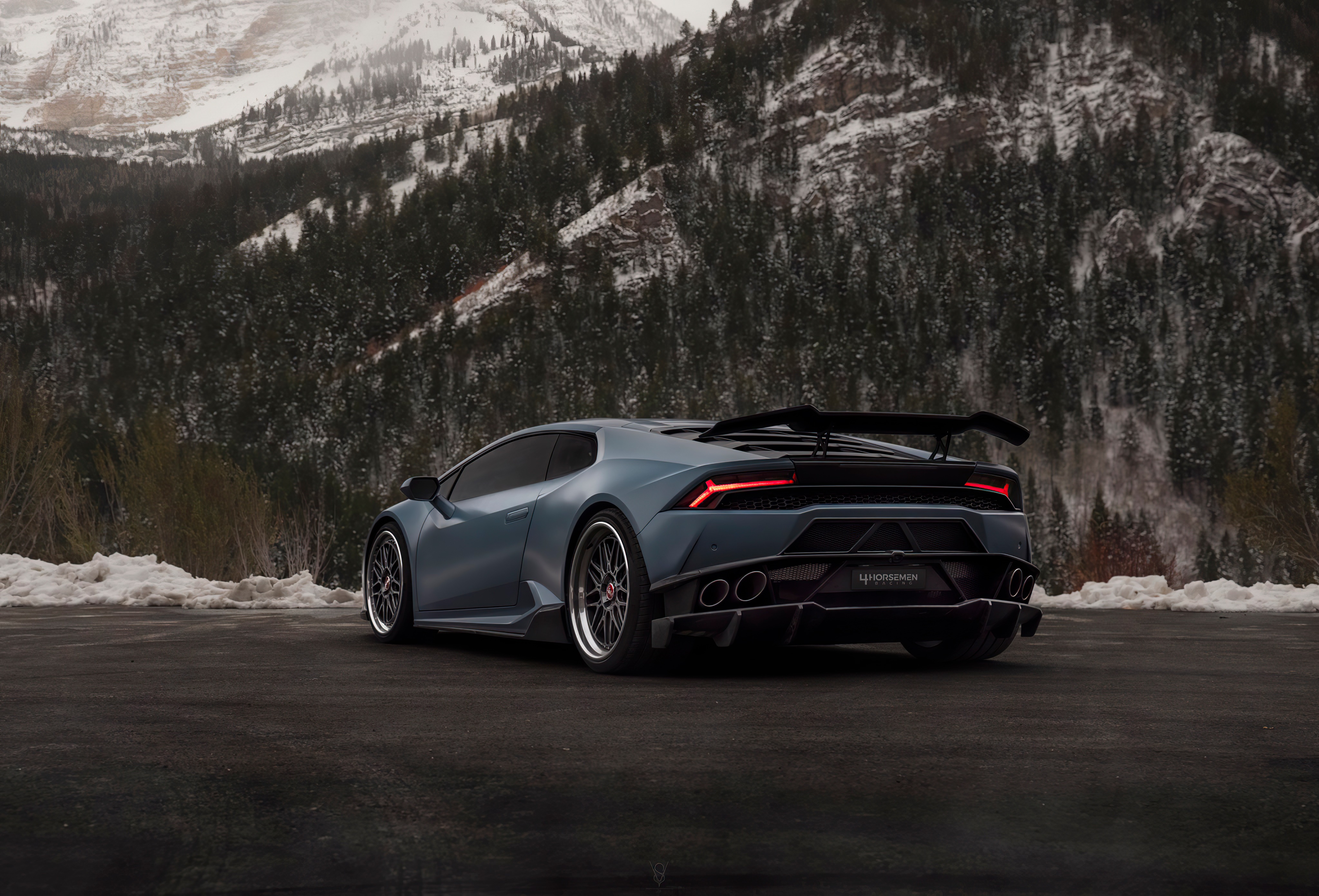 Lamborghini Huracan rear view in snowy mountains HD Wallpaper