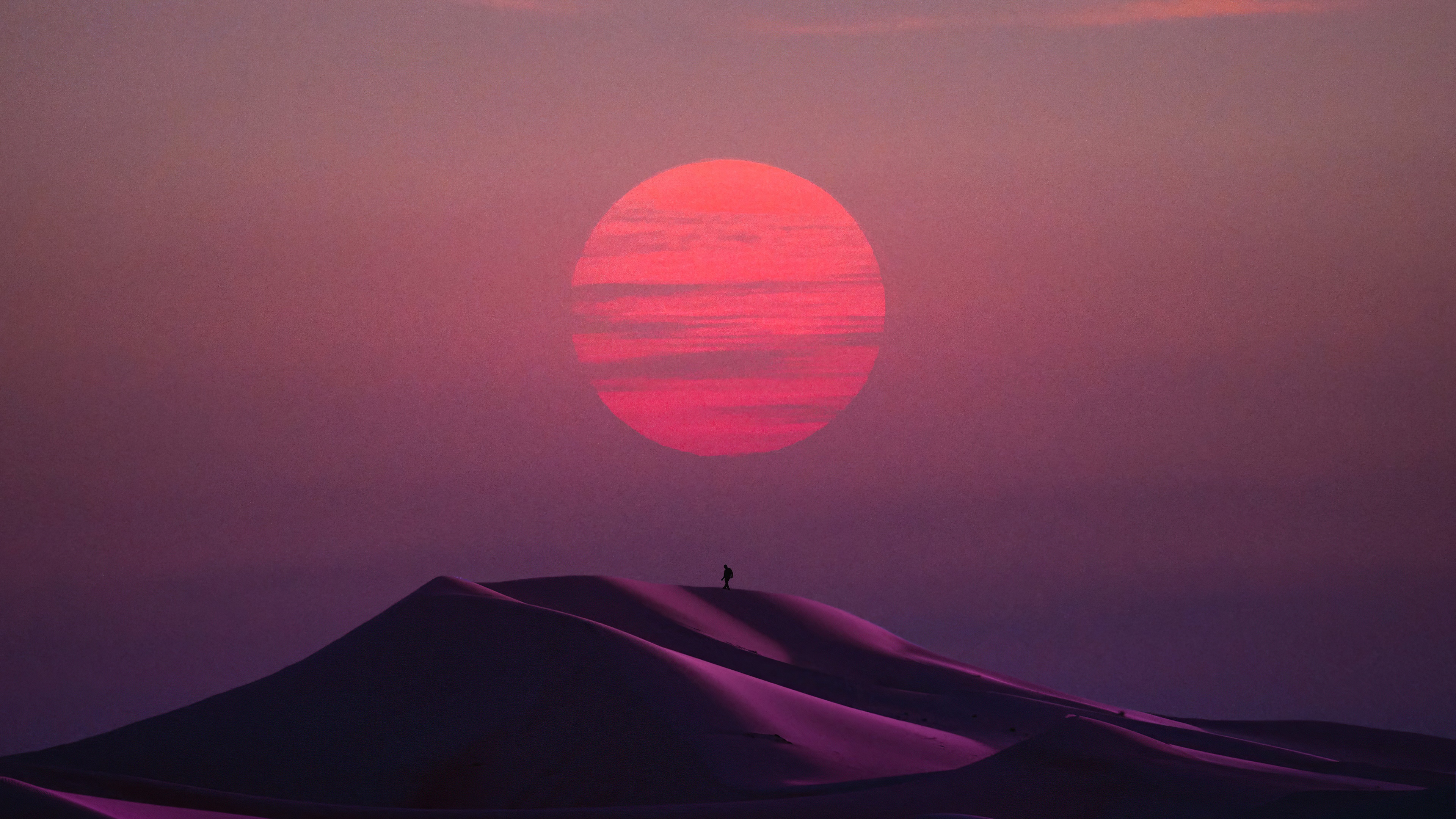 Person standing on sand dunes at sunset 4K HD Wallpaper